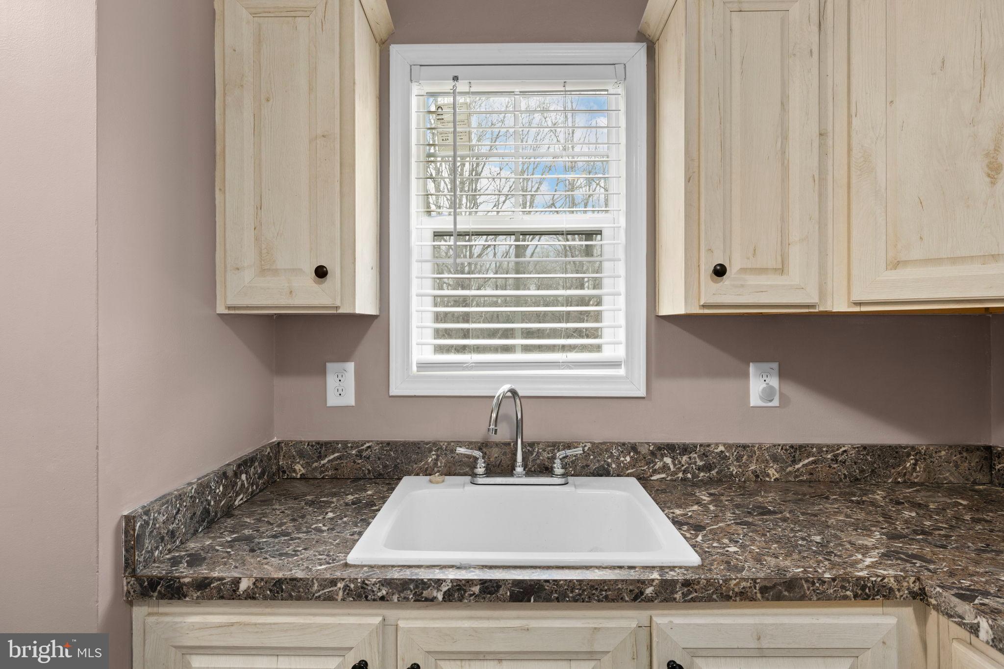 13115 Arcadia Road Woodford, VA 22580 - Photo 19 of 44 Bright and inviting kitchen workspace.