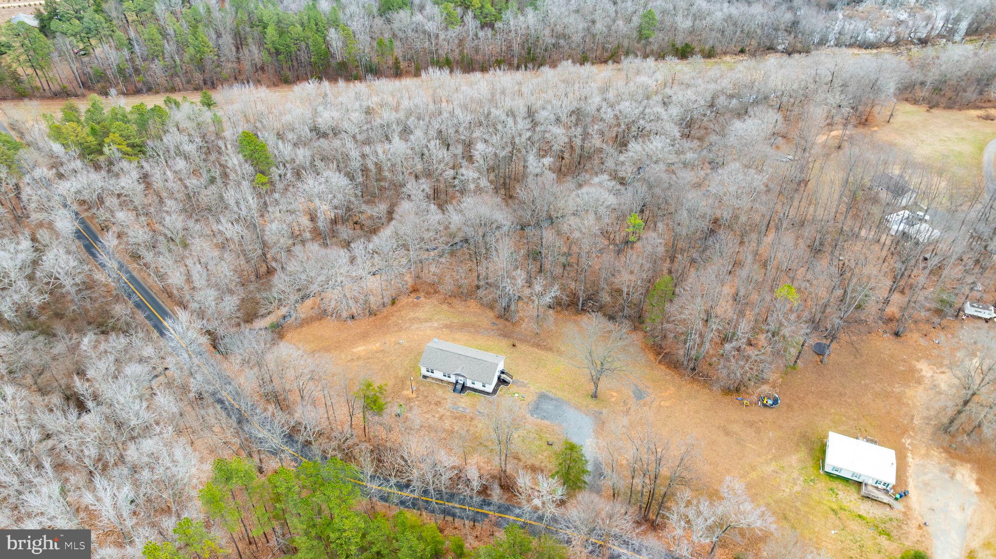 13115 Arcadia Road Woodford, VA 22580 - Photo 35 of 44 Serene retreat amidst winter's embrace.