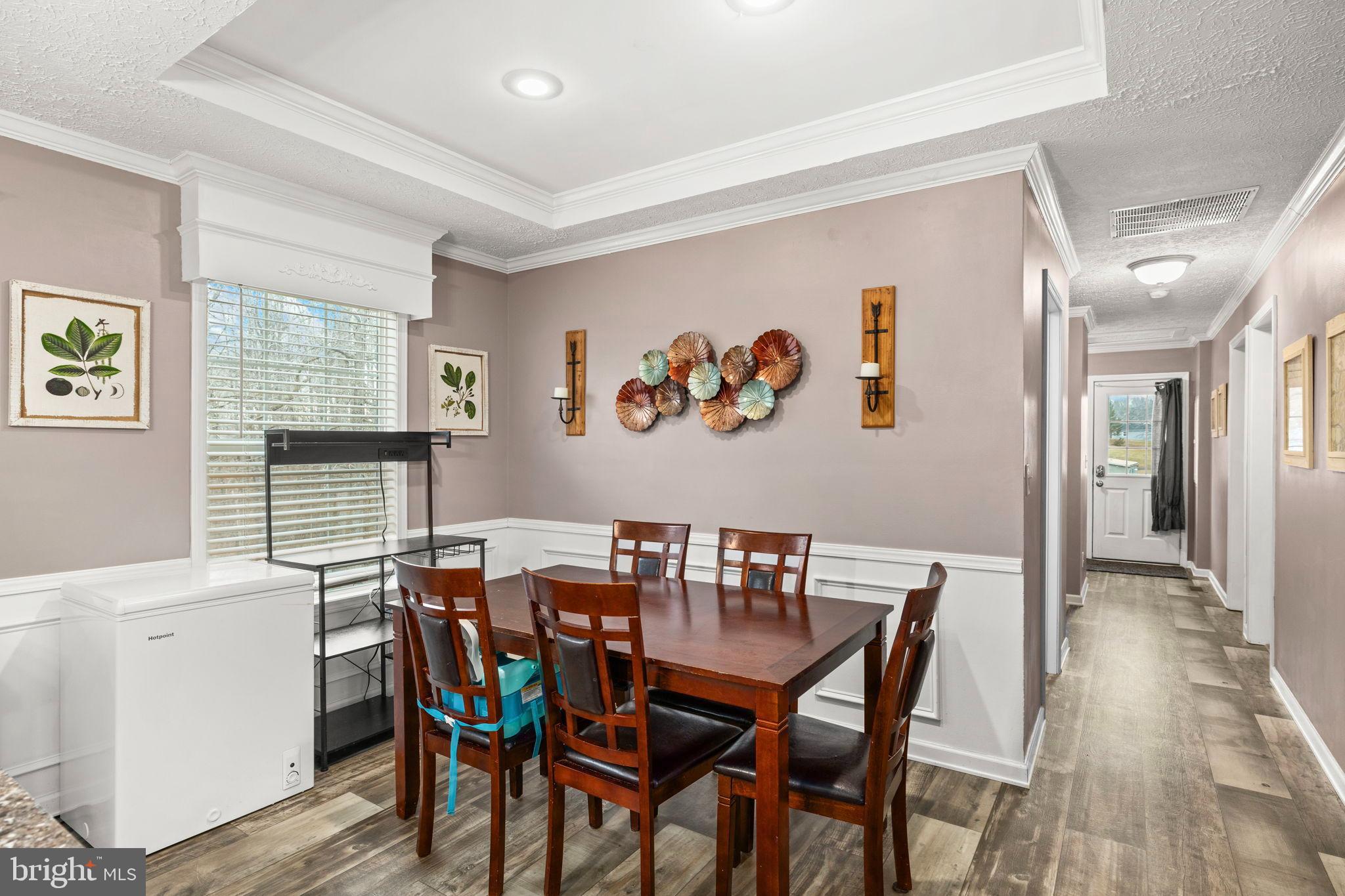 13115 Arcadia Road Woodford, VA 22580 - Photo 9 of 44 Charming dining area with modern accents.