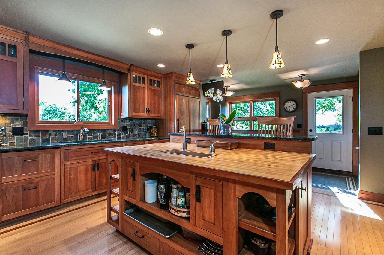 4757 North Hammer Road Scales Mound, IL 61075 - Photo 19 of 95 a kitchen with stainless steel appliances kitchen island a large island in the center and a large window