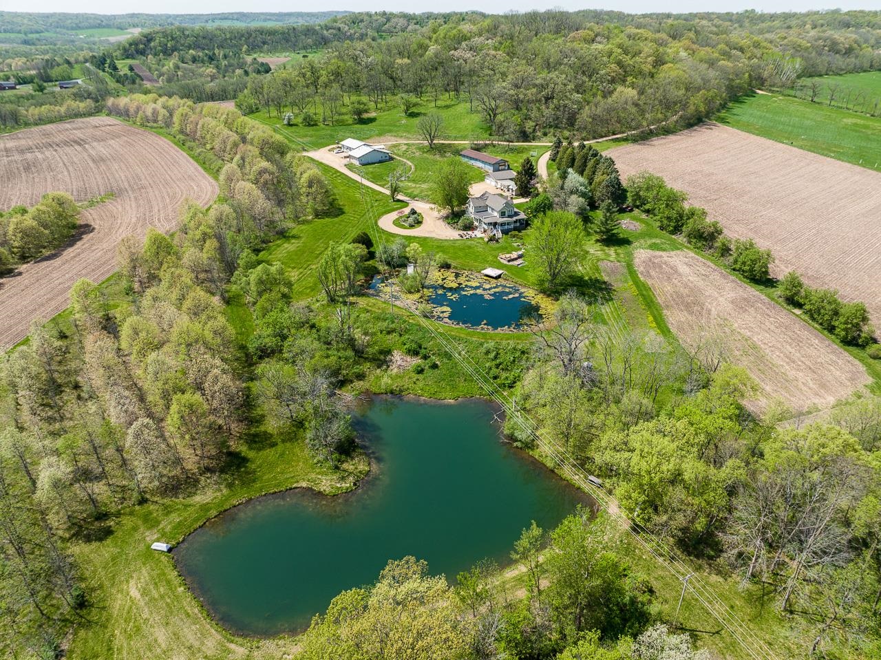 4757 North Hammer Road Scales Mound, IL 61075 - Photo 2 of 95 an aerial view of residential houses with outdoor space and trees