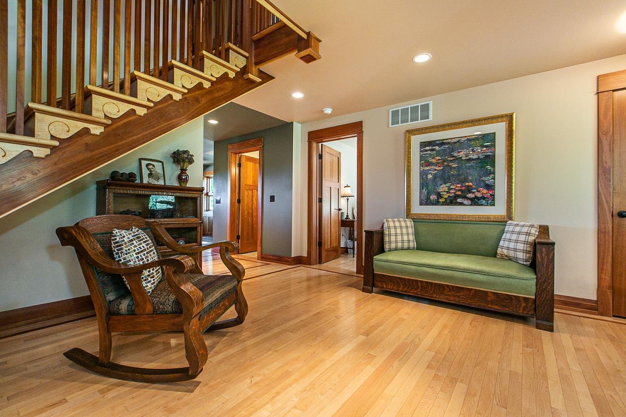4757 North Hammer Road Scales Mound, IL 61075 - Photo 22 of 95 a living room with furniture and a wooden floor
