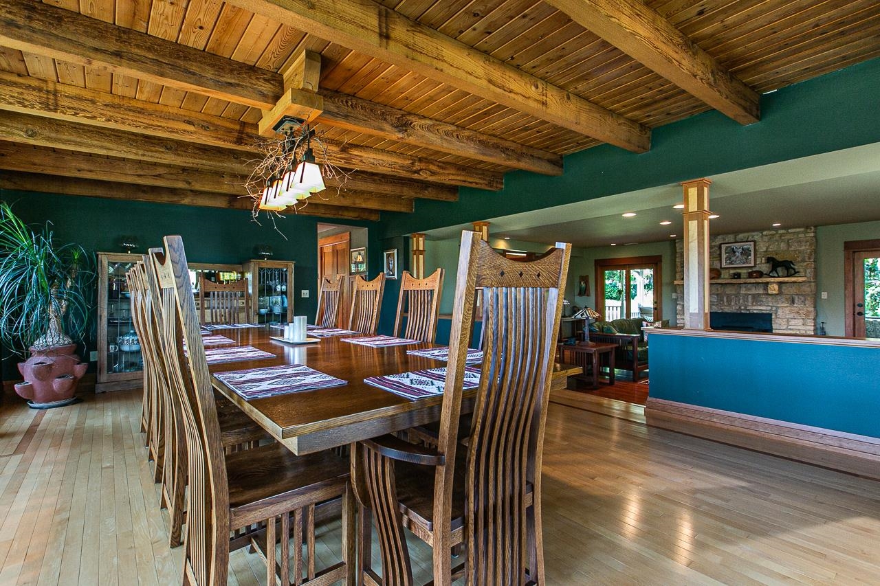 4757 North Hammer Road Scales Mound, IL 61075 - Photo 23 of 95 a view of a dining room with furniture and a chandelier