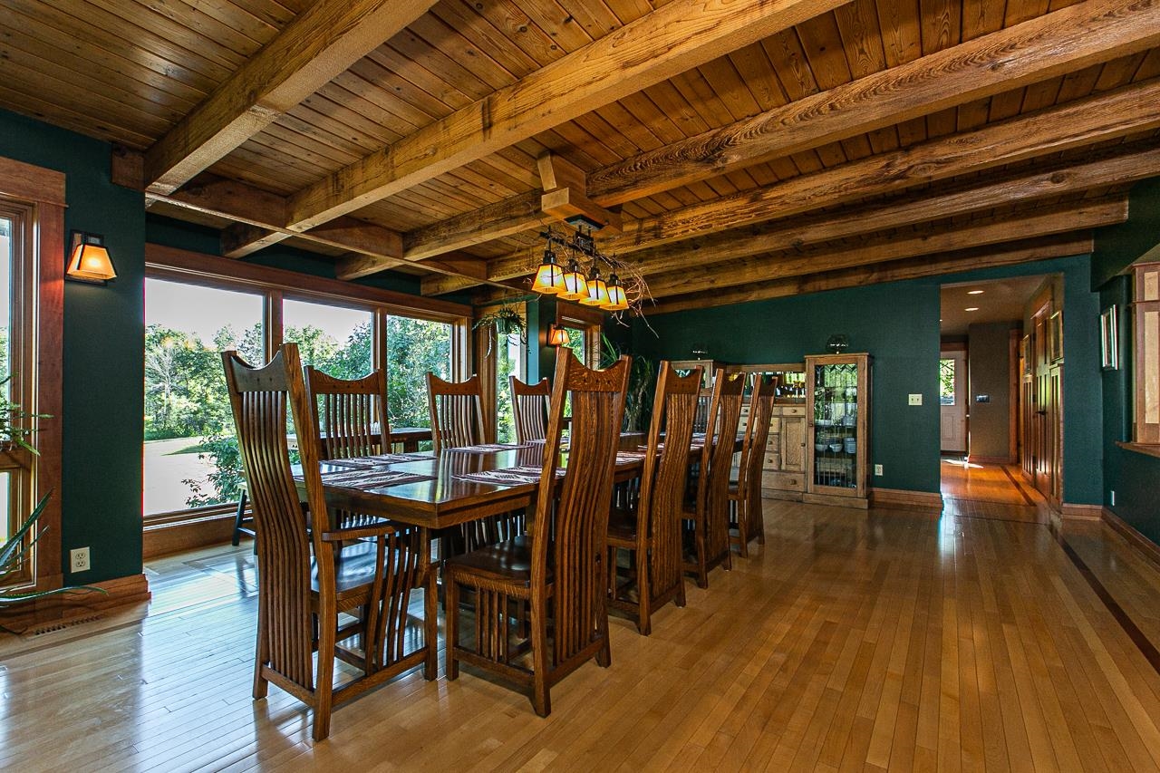 4757 North Hammer Road Scales Mound, IL 61075 - Photo 24 of 95 a view of a dining room with furniture and wooden floor