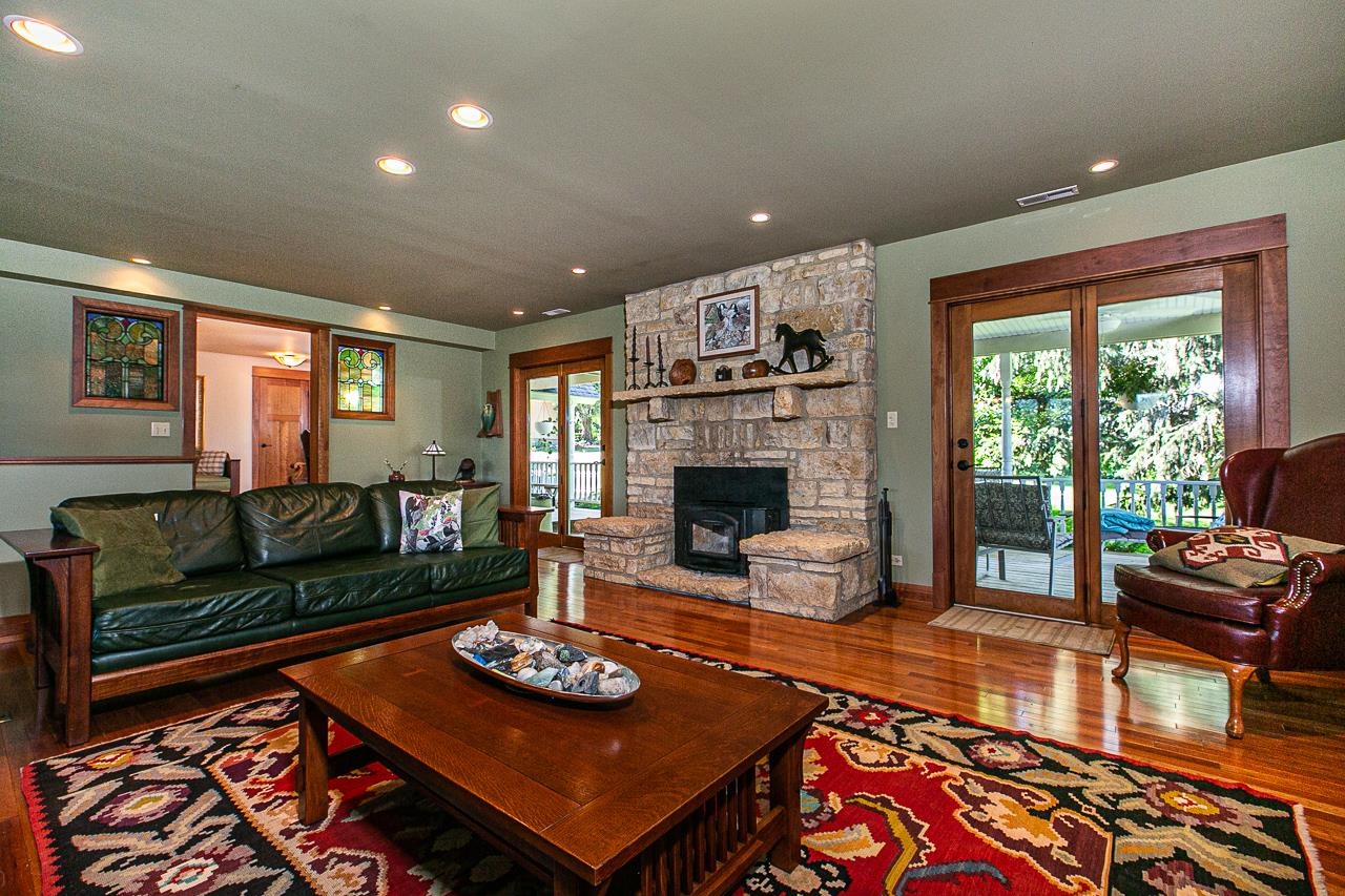 4757 North Hammer Road Scales Mound, IL 61075 - Photo 41 of 95 a living room with furniture and a fireplace