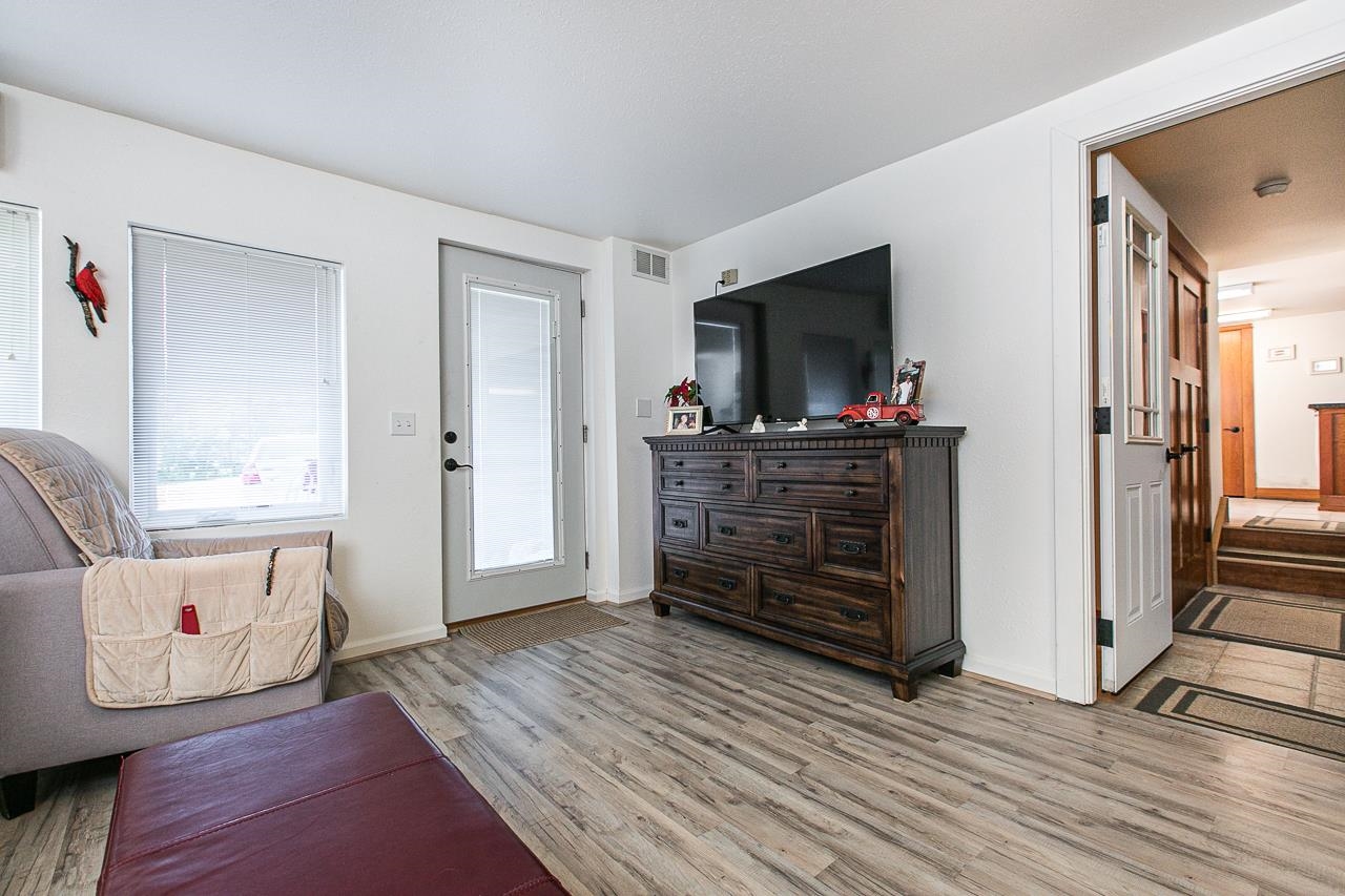 4757 North Hammer Road Scales Mound, IL 61075 - Photo 54 of 95 a living room with furniture and a flat screen tv