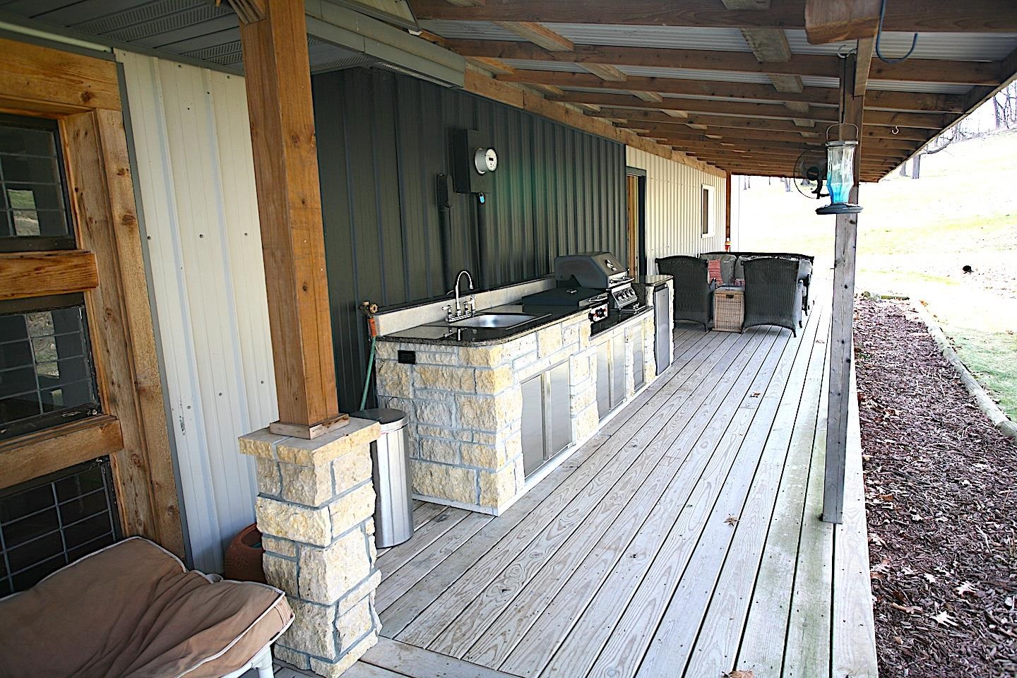 4757 North Hammer Road Scales Mound, IL 61075 - Photo 67 of 95 a view of a balcony with furniture