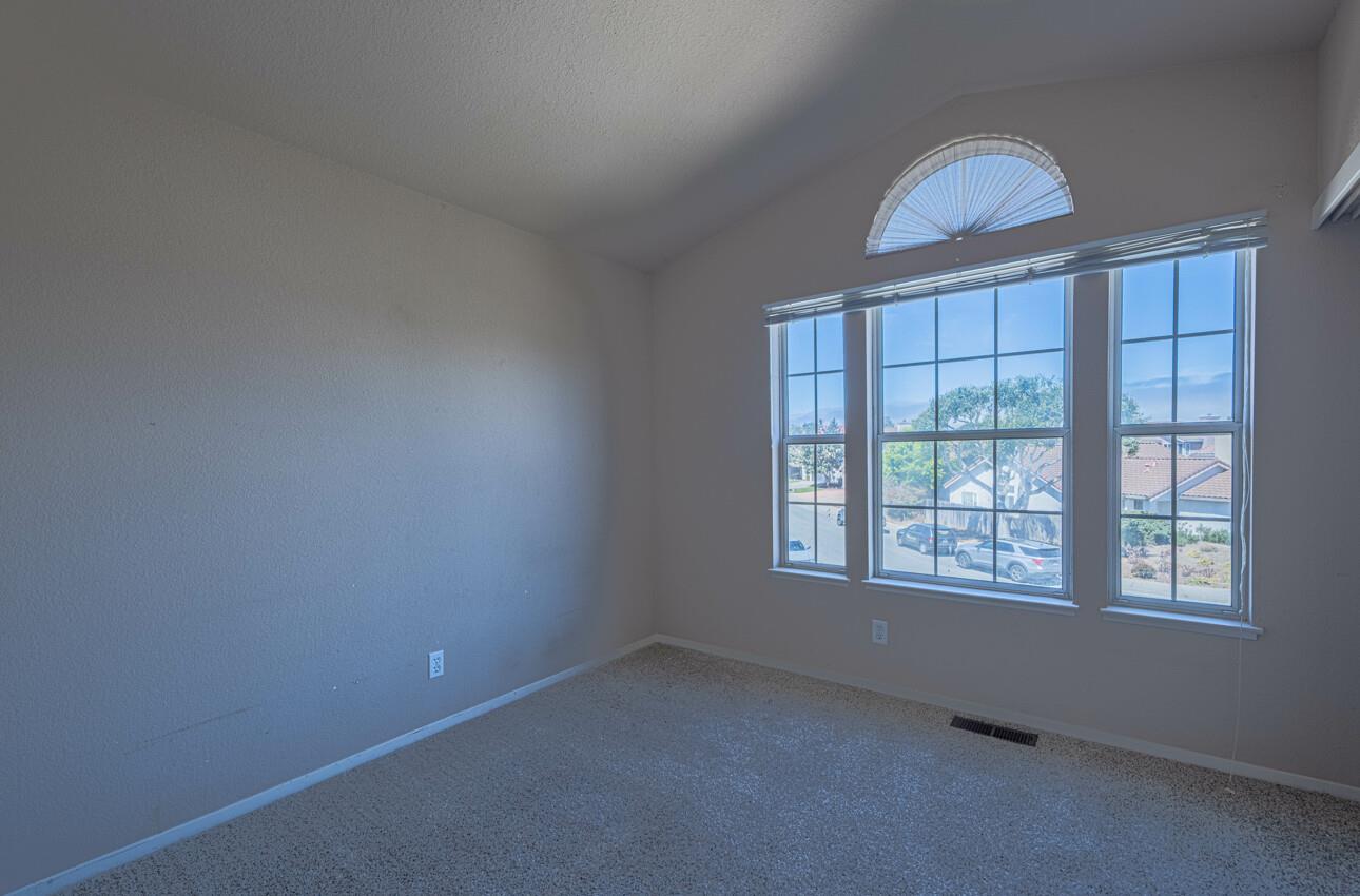 337 Quebrada Del Mar Road Marina, CA 93933 - Photo 12 of 44 an empty room with a window