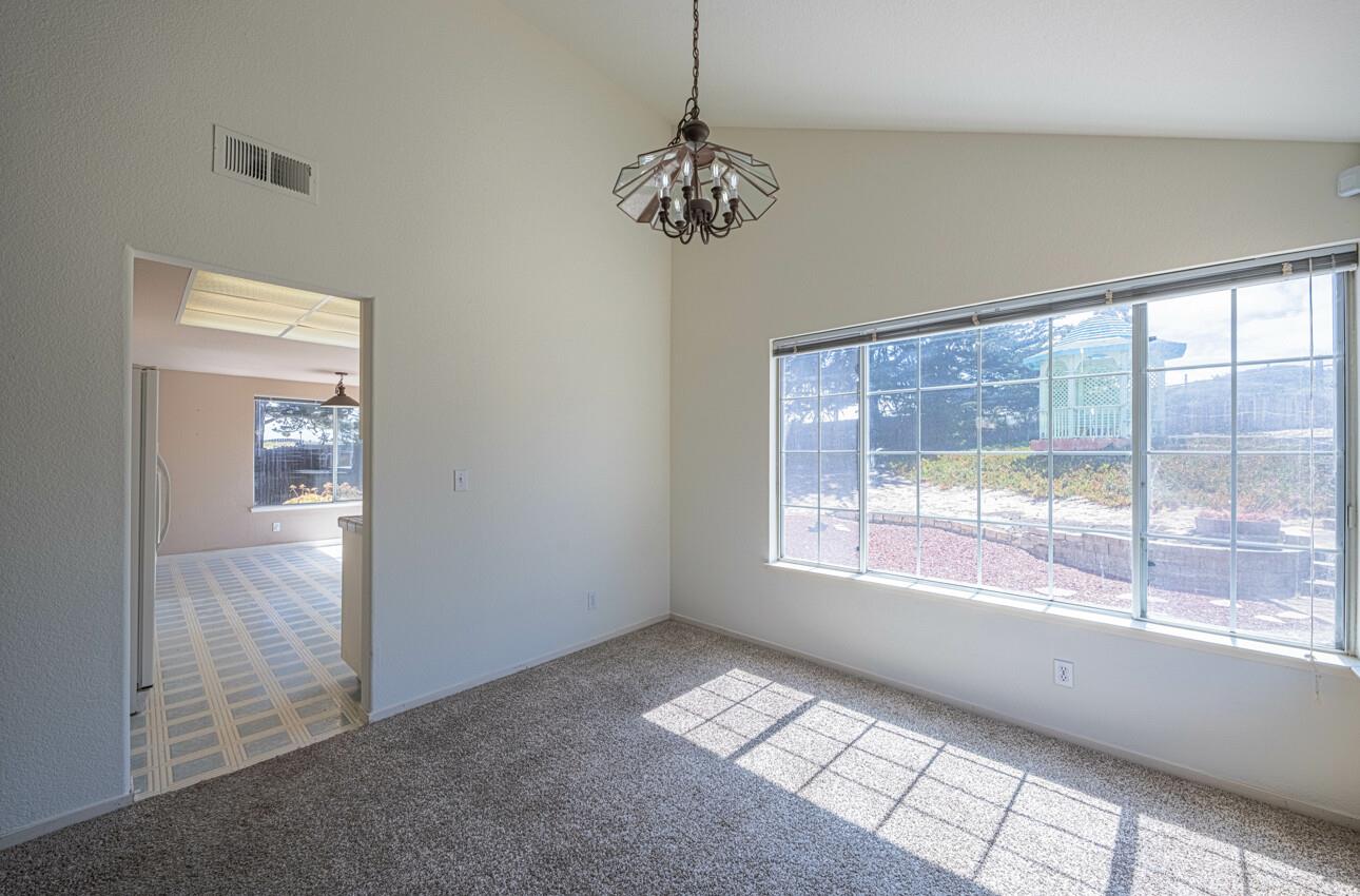 337 Quebrada Del Mar Road Marina, CA 93933 - Photo 17 of 44 a view of an empty room with a window