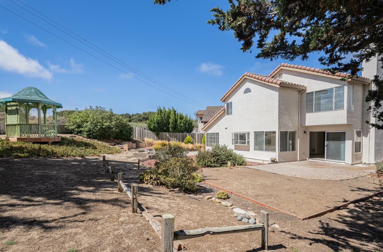 337 Quebrada Del Mar Road Marina, CA 93933 - Photo 21 of 44 a front view of a house with a yard