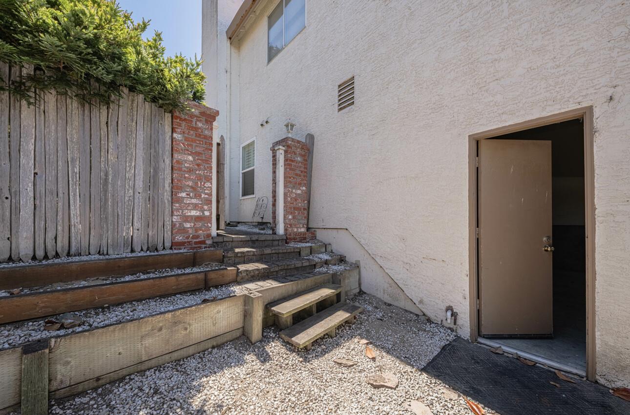 337 Quebrada Del Mar Road Marina, CA 93933 - Photo 26 of 44 a black leather couch sitting in a bathroom next to a window