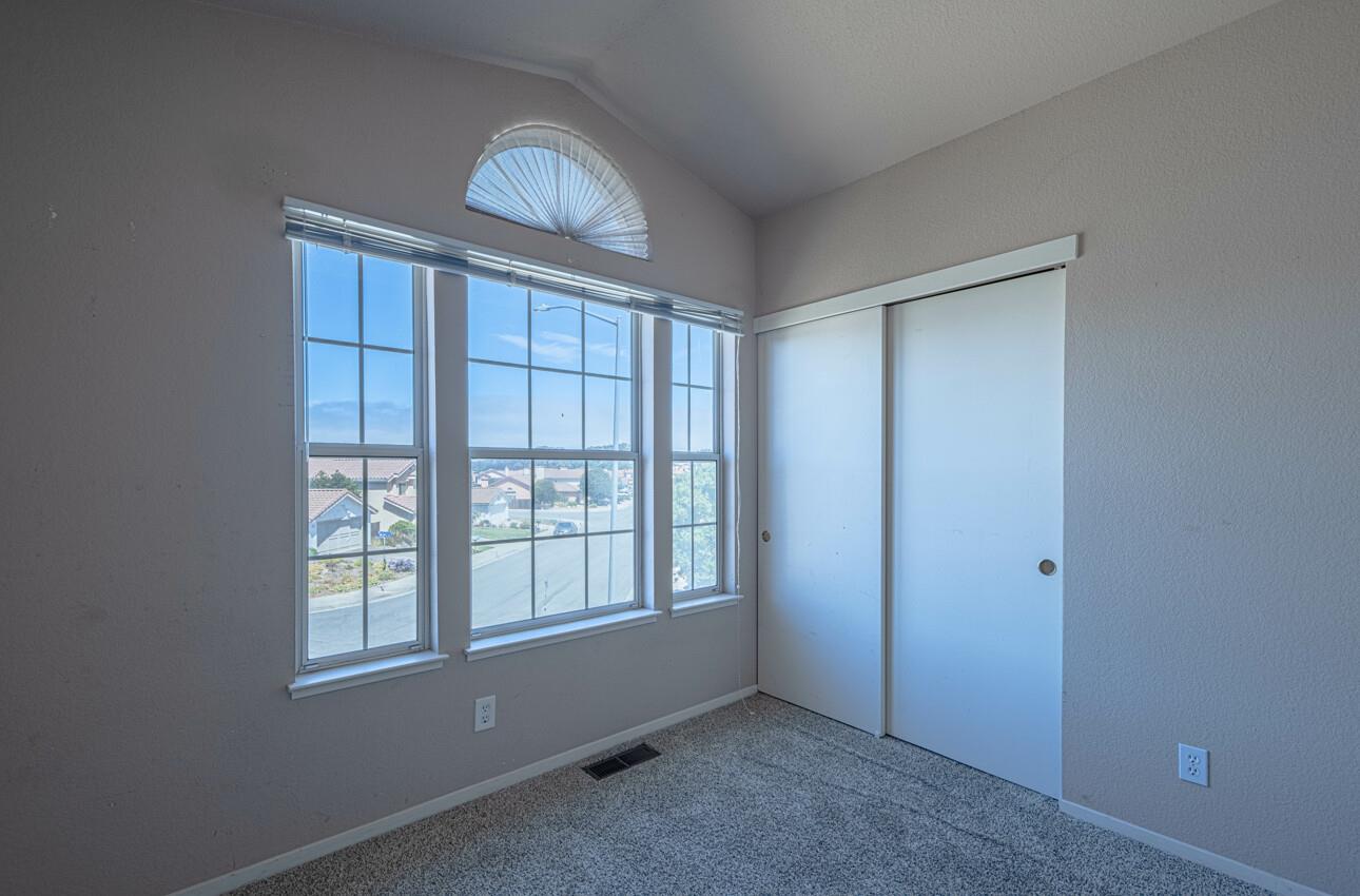 337 Quebrada Del Mar Road Marina, CA 93933 - Photo 29 of 44 a view of an empty room with a window