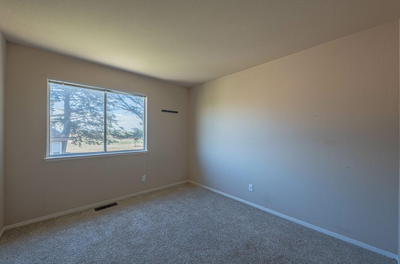 337 Quebrada Del Mar Road Marina, CA 93933 - Photo 33 of 44 an empty room with a window