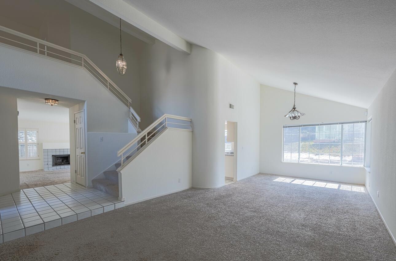 337 Quebrada Del Mar Road Marina, CA 93933 - Photo 7 of 44 a view of an empty room with a window