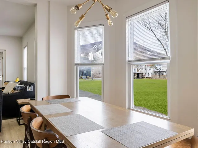 a kitchen with stainless steel appliances granite countertop a sink and cabinets
