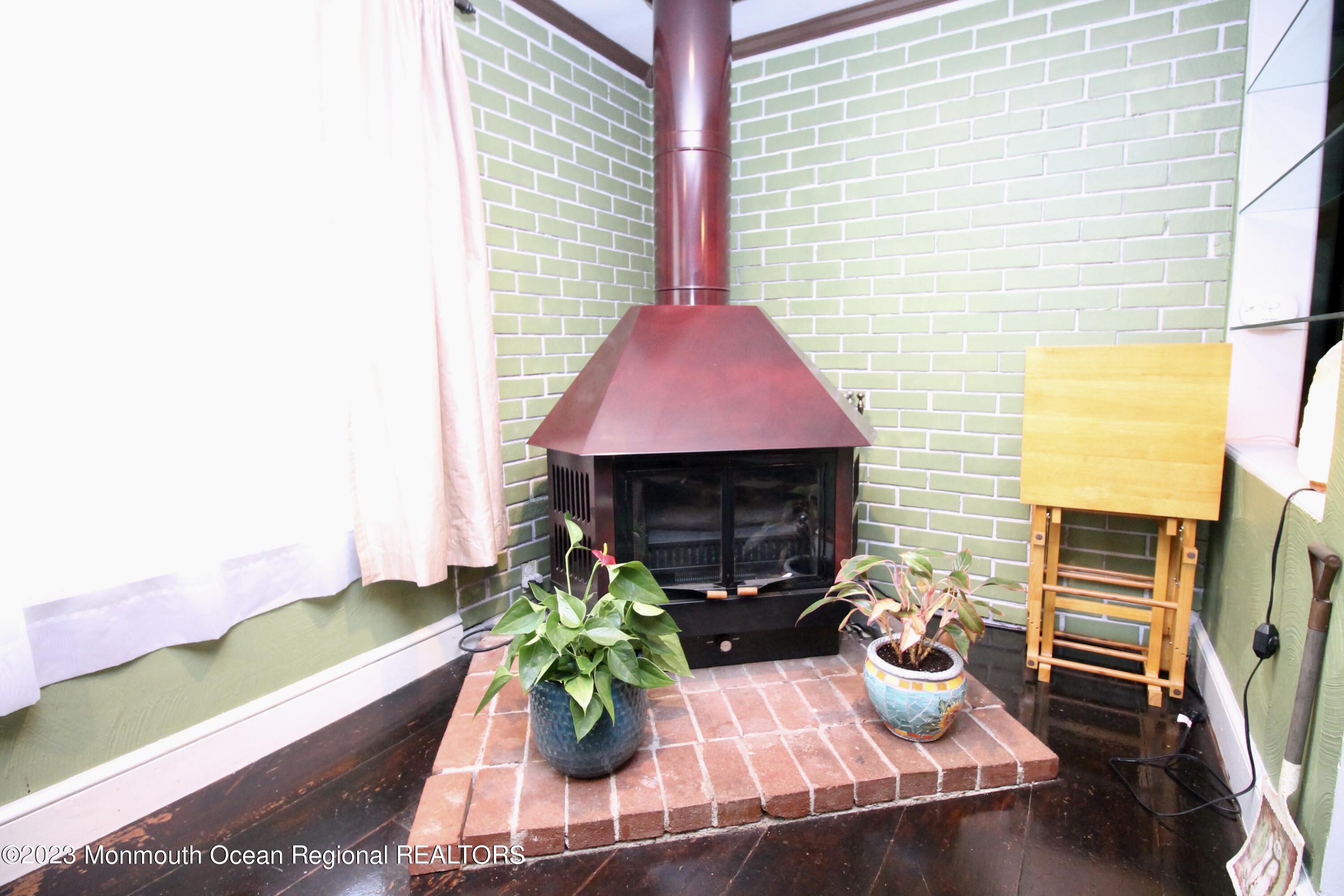 216 Lenape Trail Jackson, NJ 08527 - Photo 11 of 58 a dining room with furniture window and wooden floor