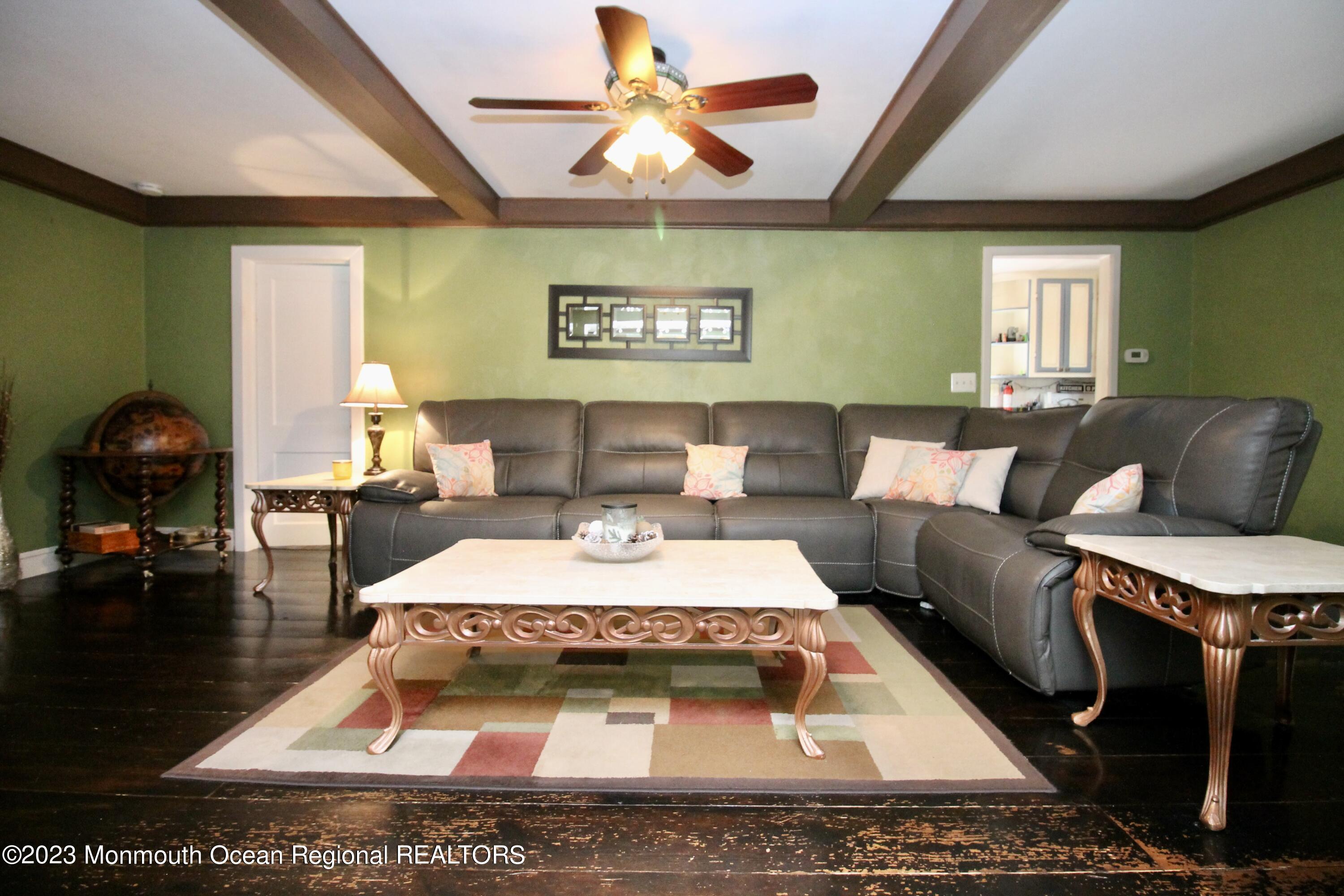 216 Lenape Trail Jackson, NJ 08527 - Photo 12 of 58 a living room with furniture and a rug