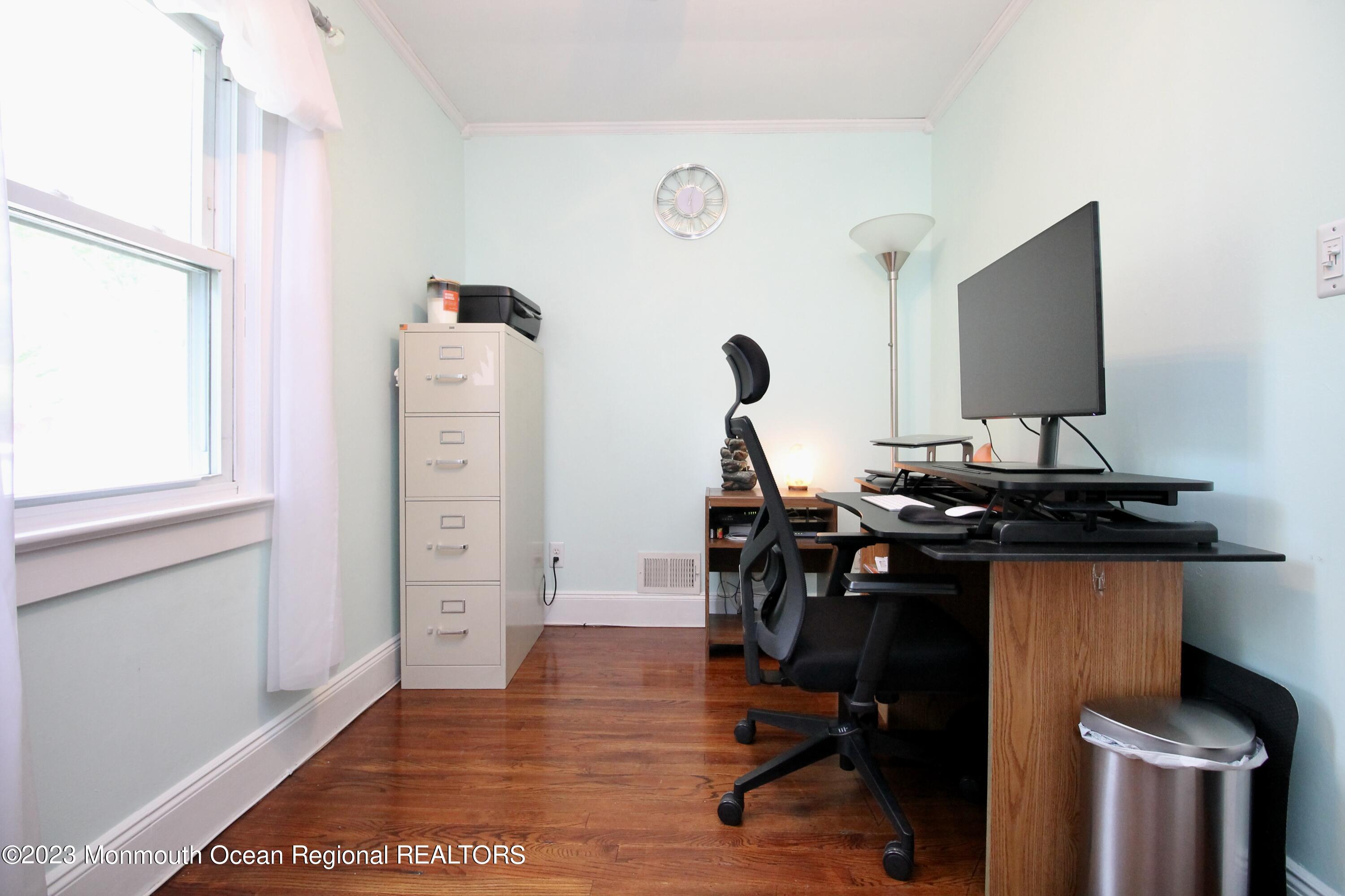216 Lenape Trail Jackson, NJ 08527 - Photo 25 of 58 a view of a workspace with furniture and wooden floor