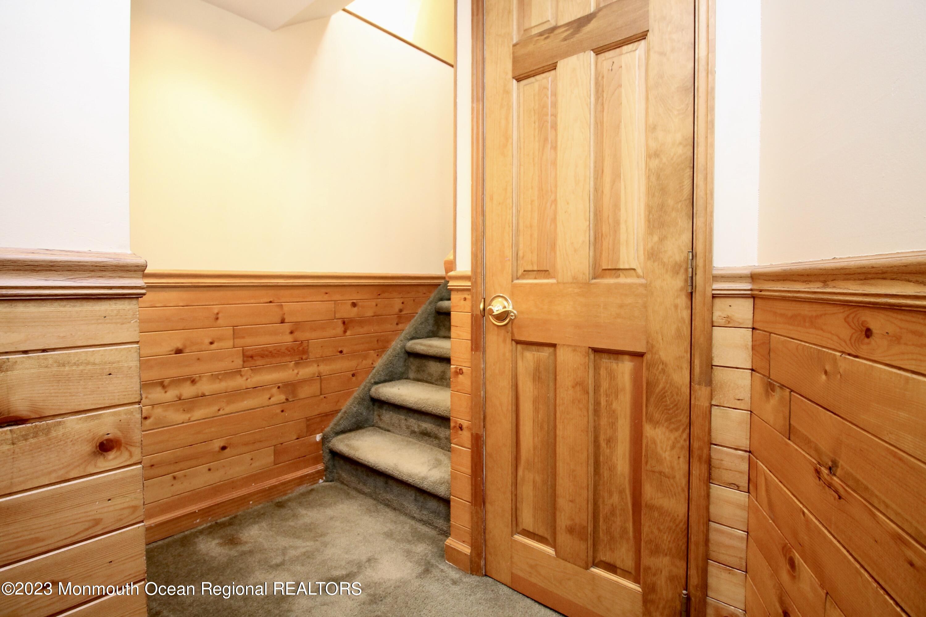 216 Lenape Trail Jackson, NJ 08527 - Photo 29 of 58 a view of a balcony with wooden floor