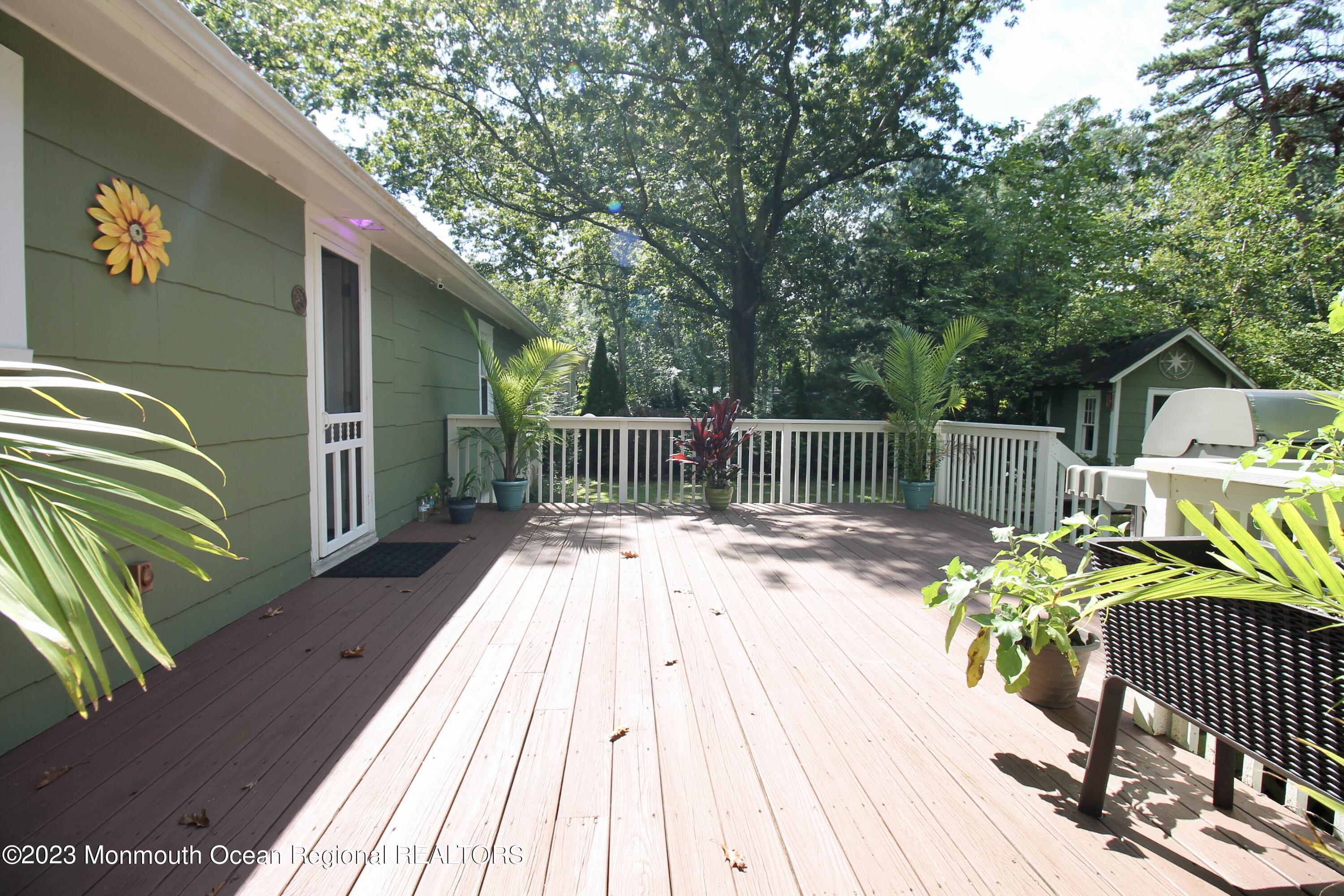 216 Lenape Trail Jackson, NJ 08527 - Photo 37 of 58 a view of balcony with wooden floor