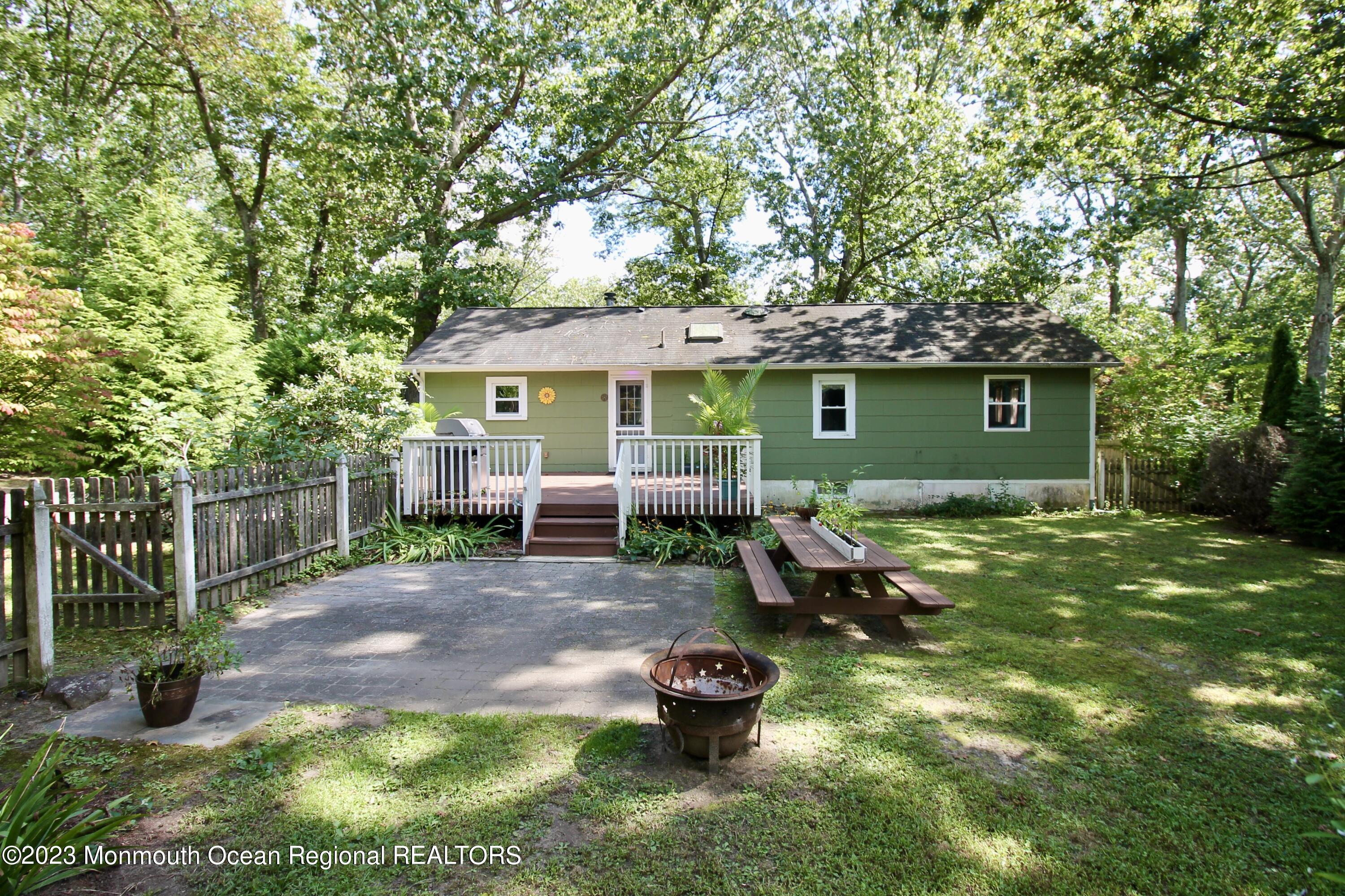 216 Lenape Trail Jackson, NJ 08527 - Photo 44 of 58 a front view of a house with garden