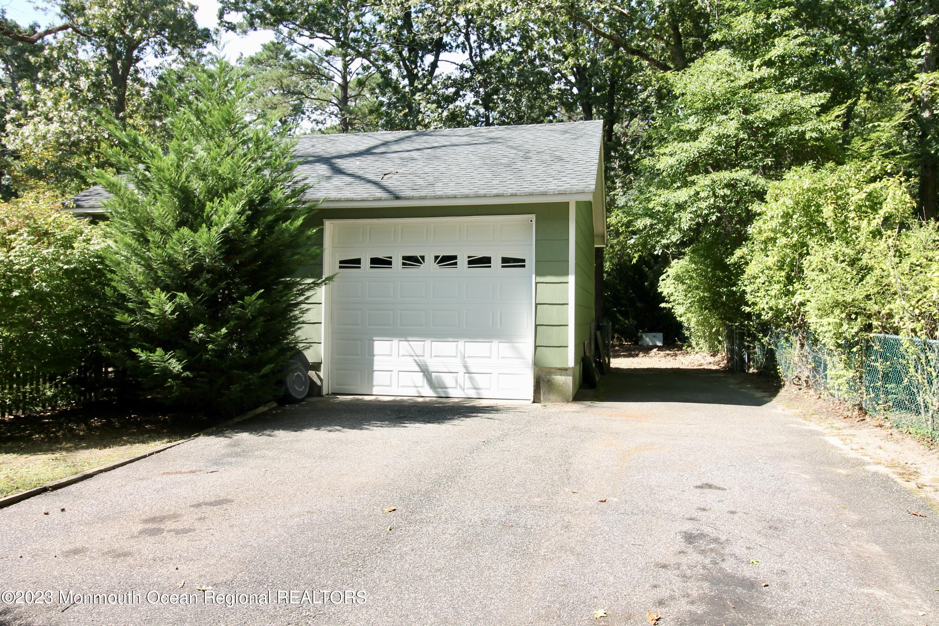 216 Lenape Trail Jackson, NJ 08527 - Photo 48 of 58 a view of a house with a tree