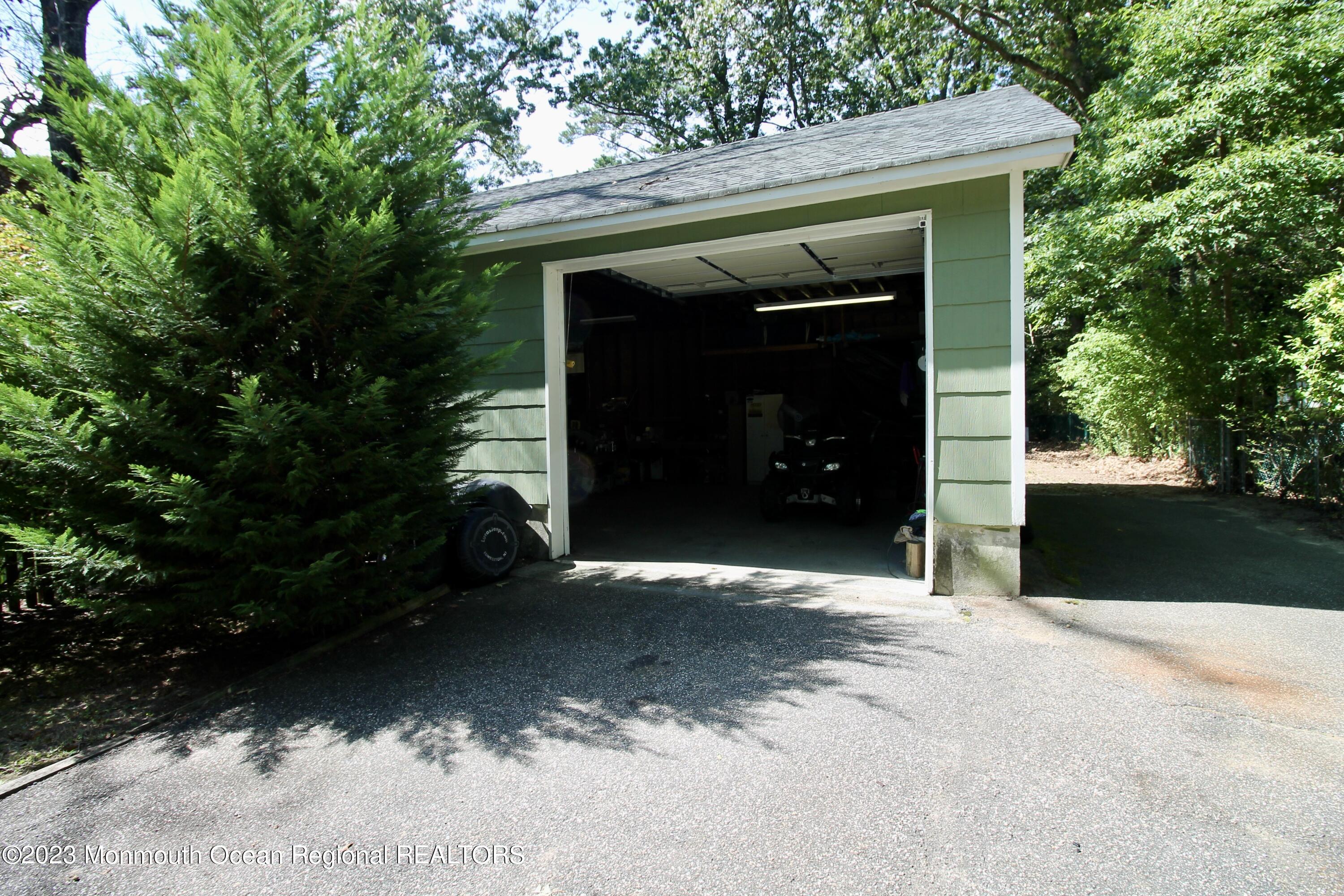216 Lenape Trail Jackson, NJ 08527 - Photo 49 of 58 a front view of a house with a yard