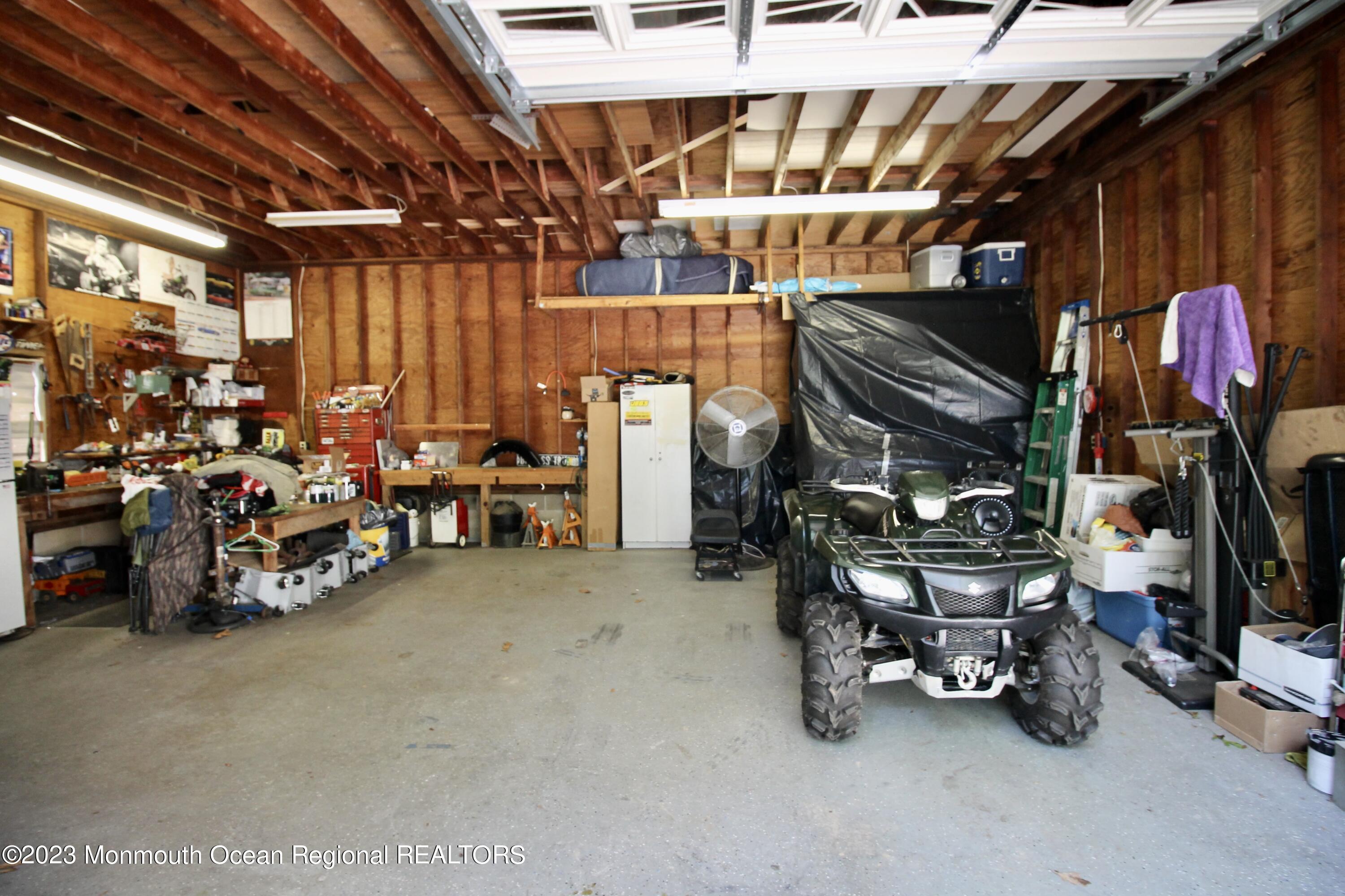 216 Lenape Trail Jackson, NJ 08527 - Photo 50 of 58 a view of a room with gym equipment