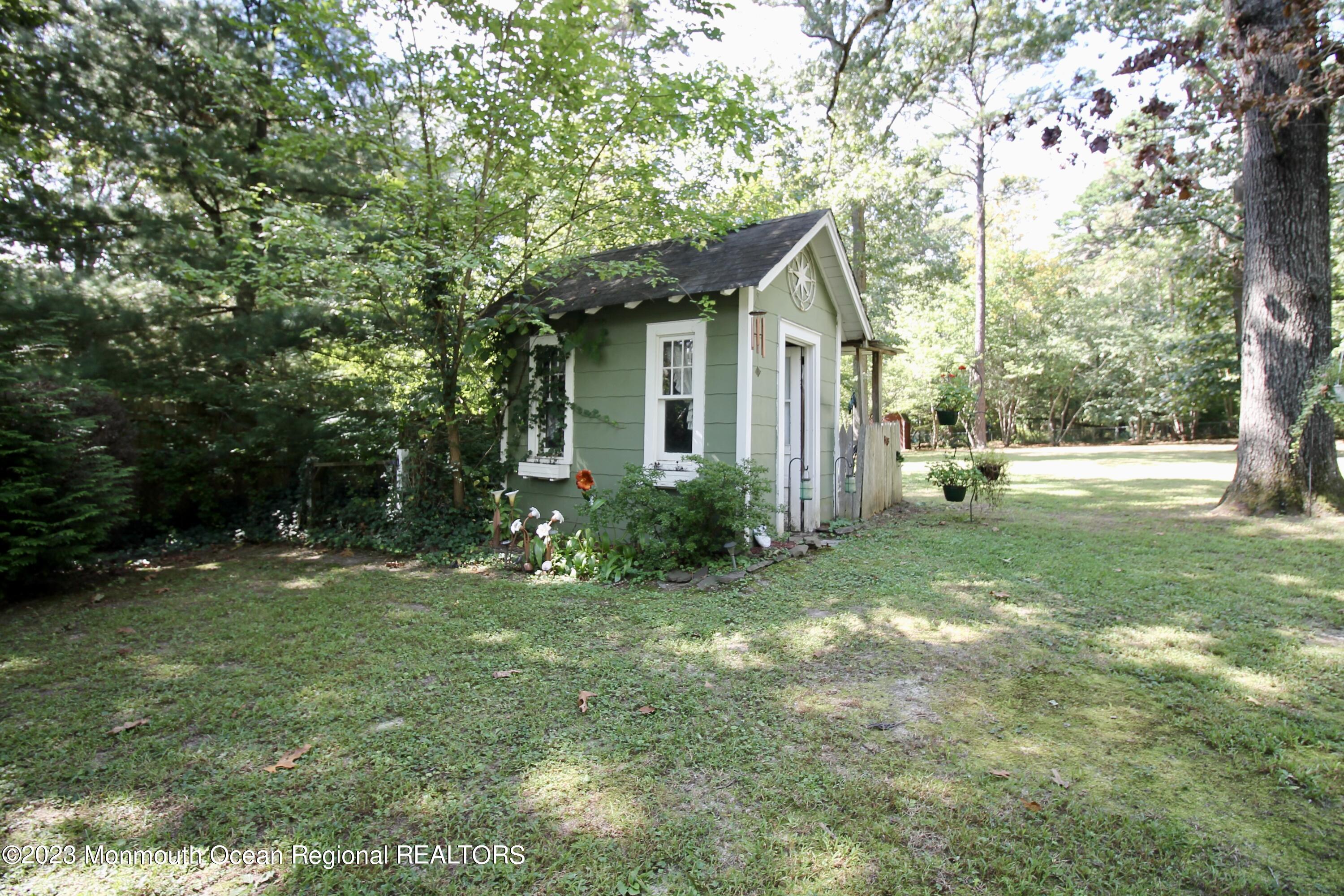 216 Lenape Trail Jackson, NJ 08527 - Photo 53 of 58 a view of a house with yard and sitting area