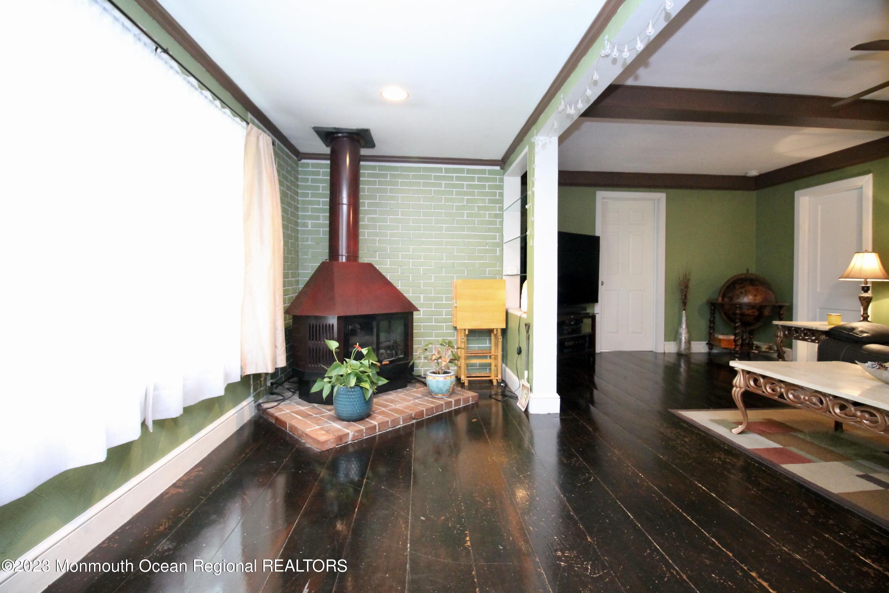 216 Lenape Trail Jackson, NJ 08527 - Photo 9 of 58 a view of a couches in patio of the house