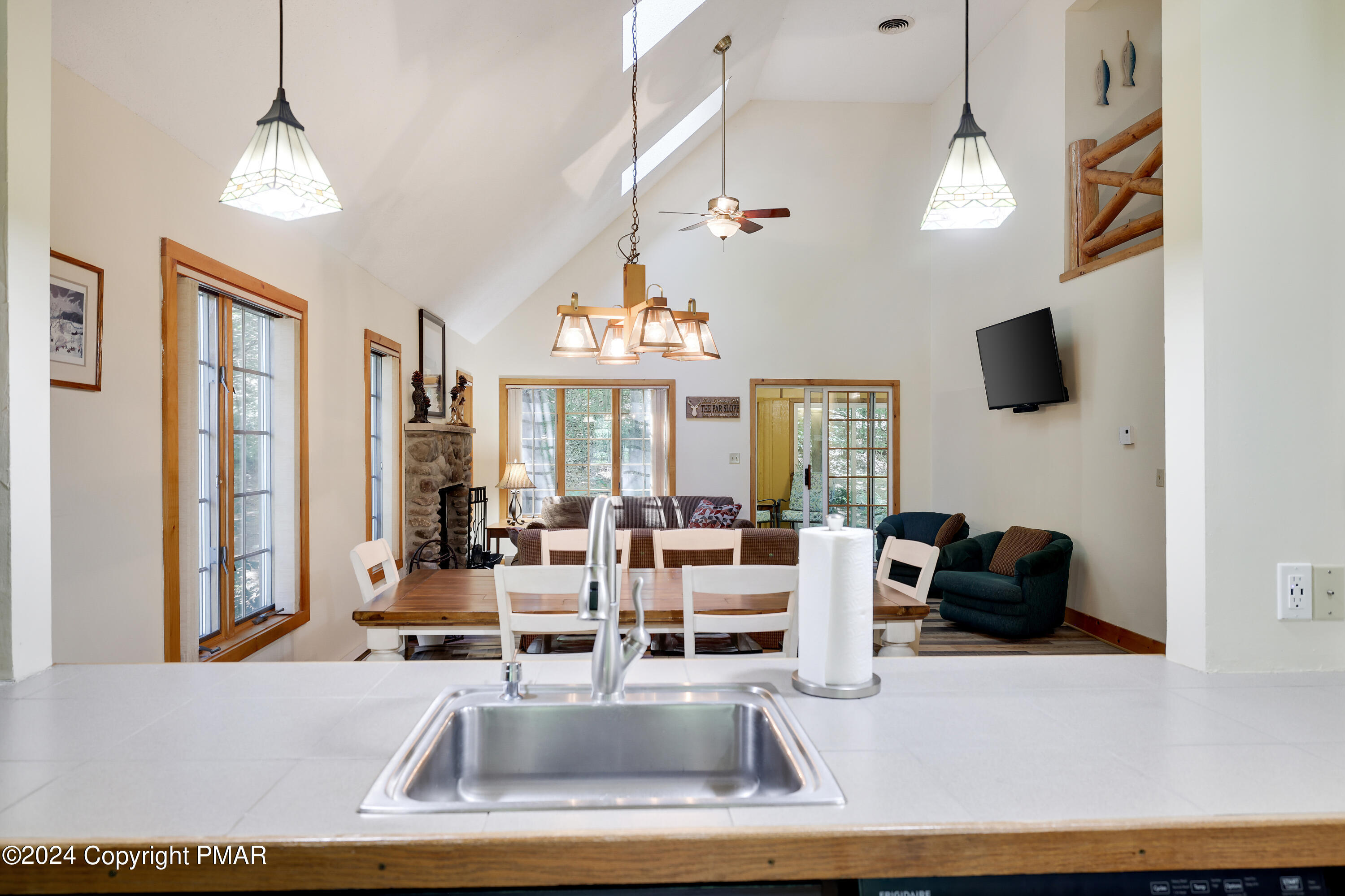 84 Short Hill Rd Lake Lake Harmony, PA 18624 - Photo 14 of 38 a living room with furniture and a flat screen tv