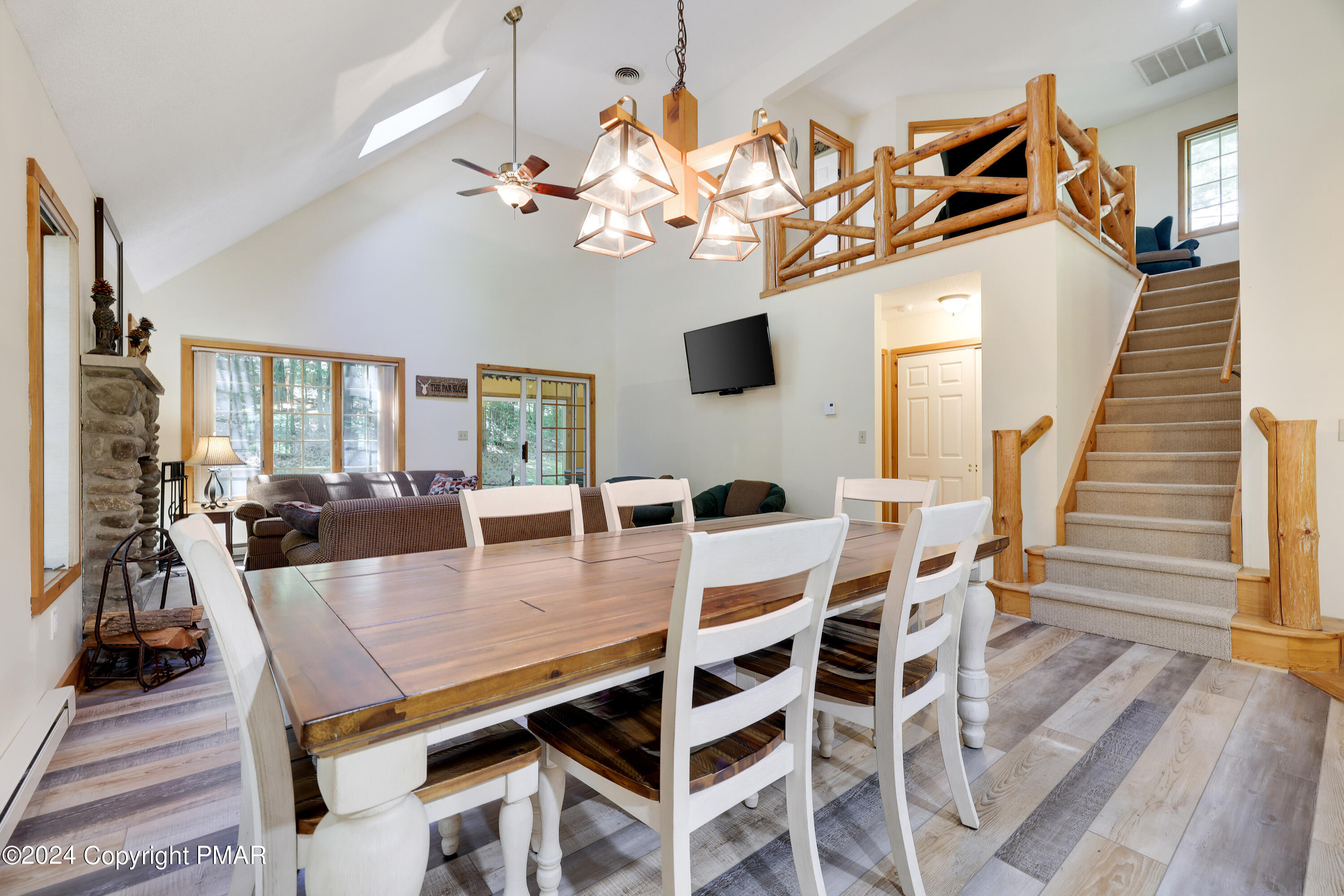 84 Short Hill Rd Lake Lake Harmony, PA 18624 - Photo 15 of 38 a view of a dining room with furniture and wooden floor