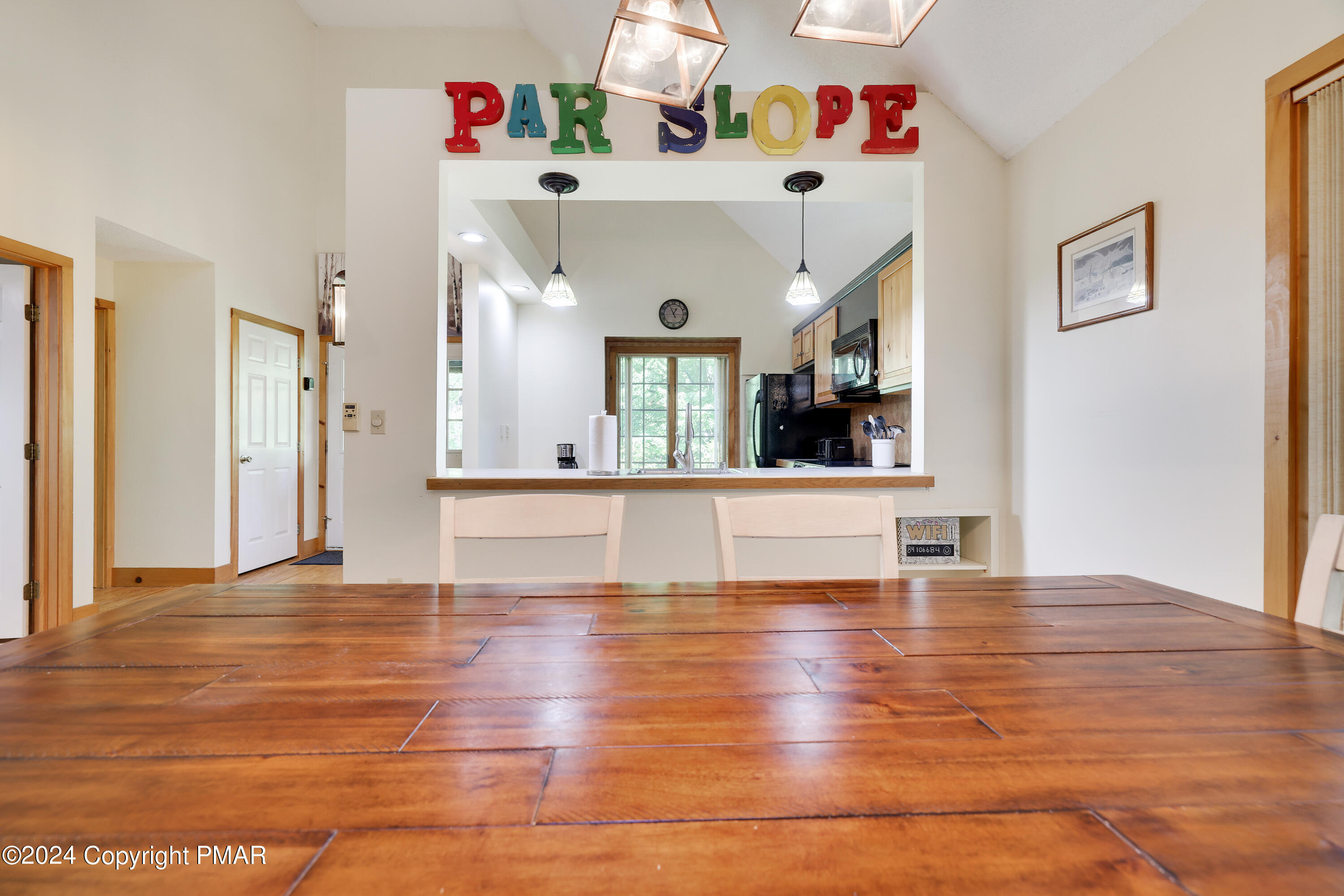 84 Short Hill Rd Lake Lake Harmony, PA 18624 - Photo 17 of 38 a view interior of a house with wooden floor and dining table