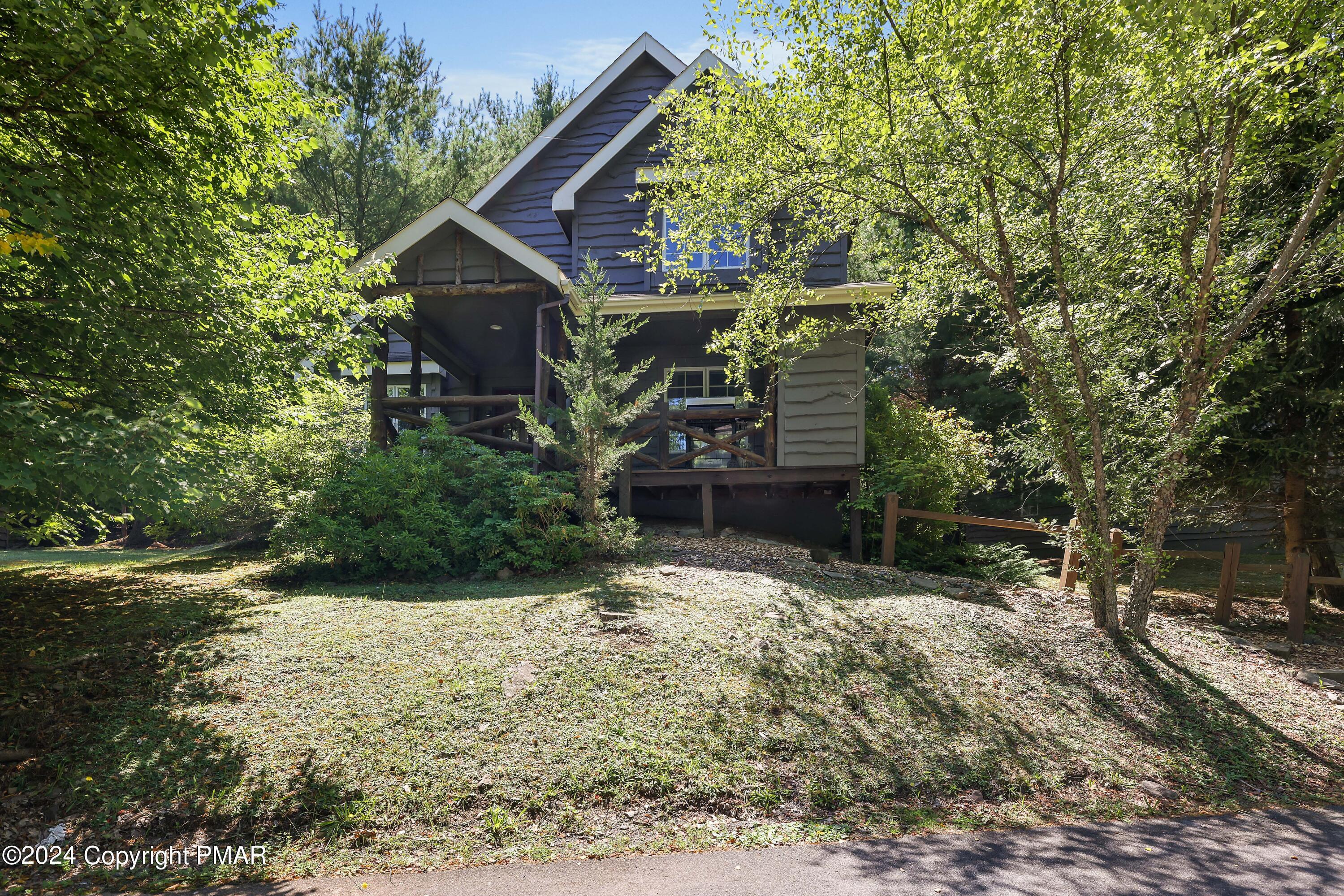 84 Short Hill Rd Lake Lake Harmony, PA 18624 - Photo 2 of 38 a view of a house with a yard