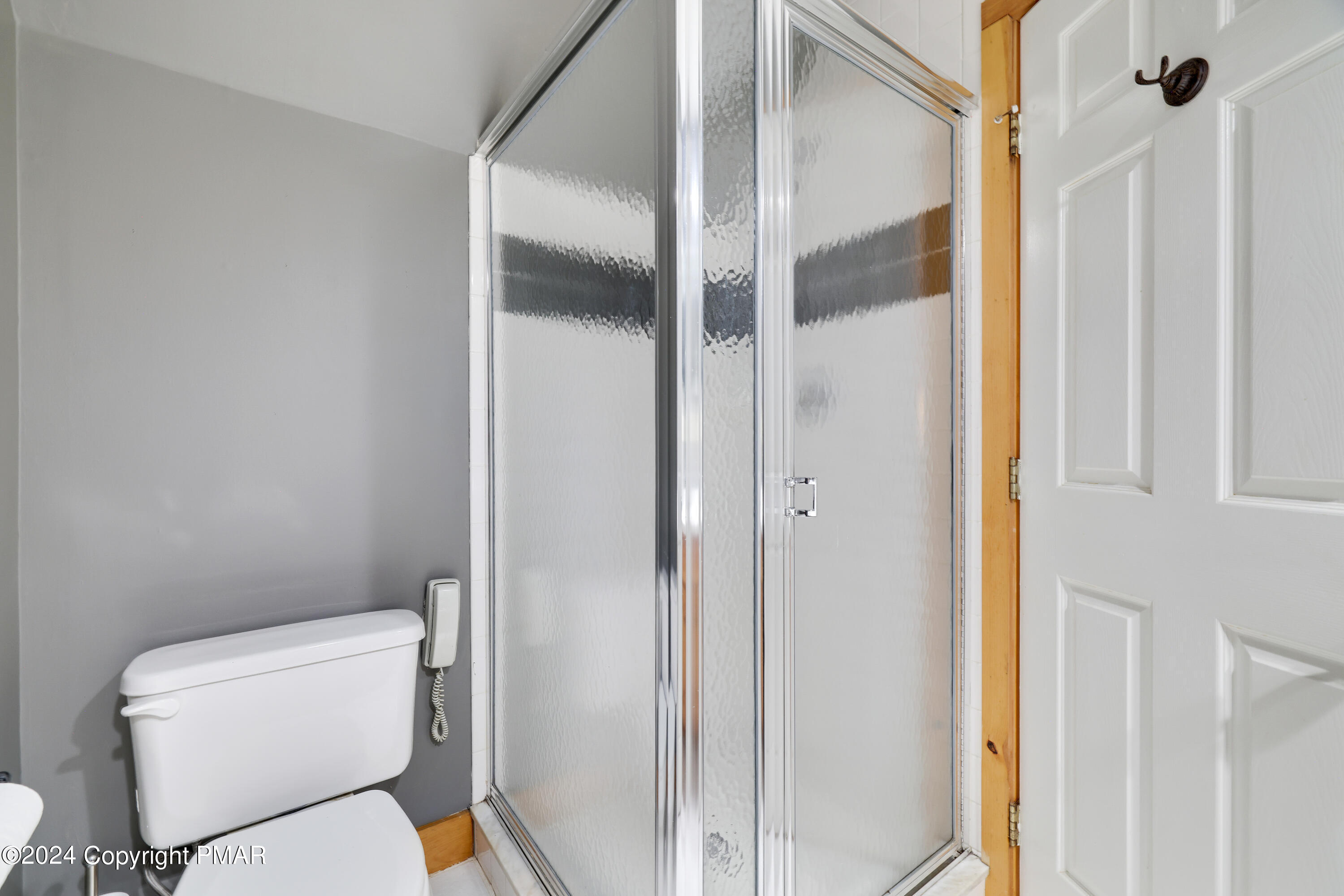 84 Short Hill Rd Lake Lake Harmony, PA 18624 - Photo 26 of 38 a white toilet sitting next to a bathroom