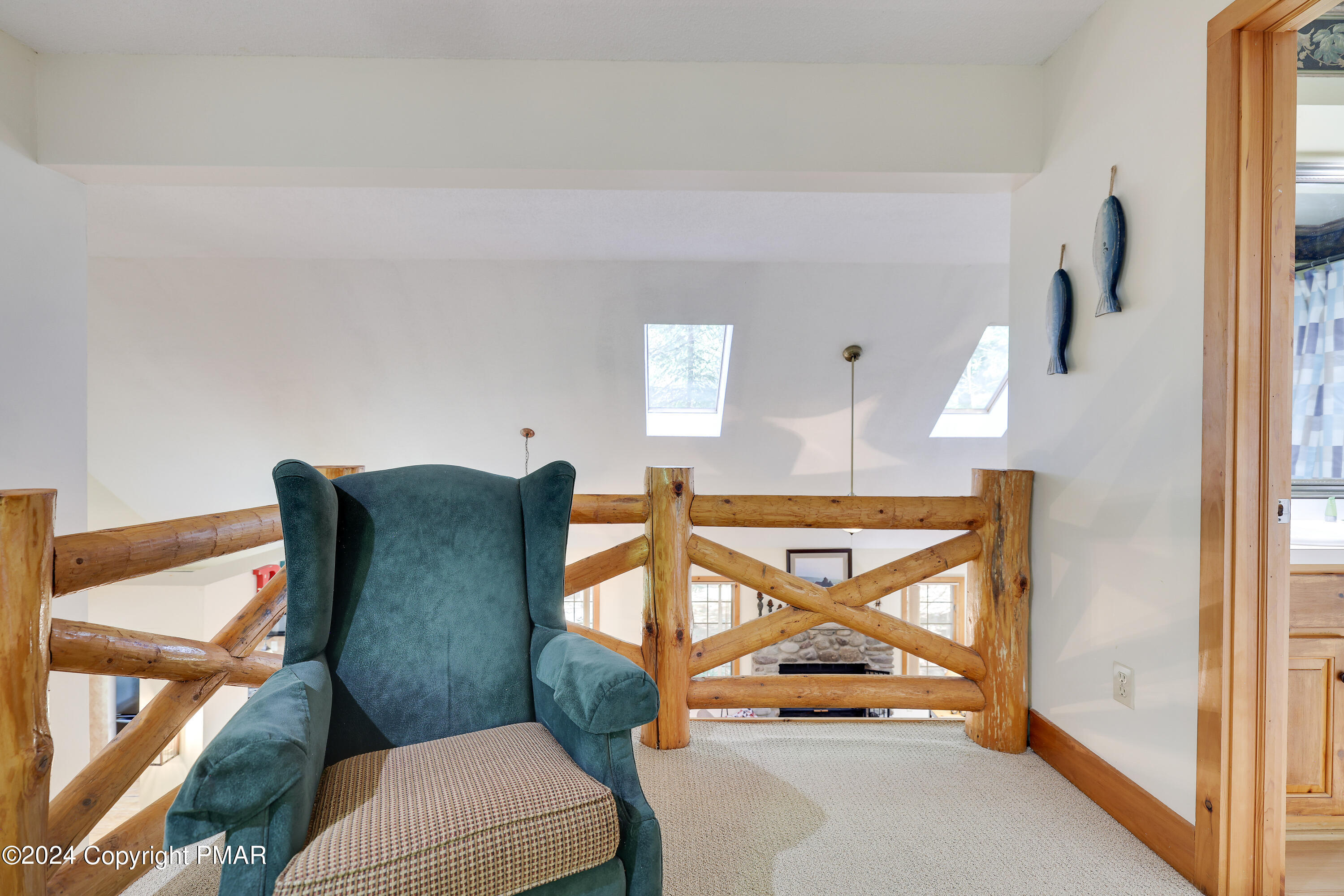 84 Short Hill Rd Lake Lake Harmony, PA 18624 - Photo 32 of 38 a living room with furniture and a floor to ceiling window