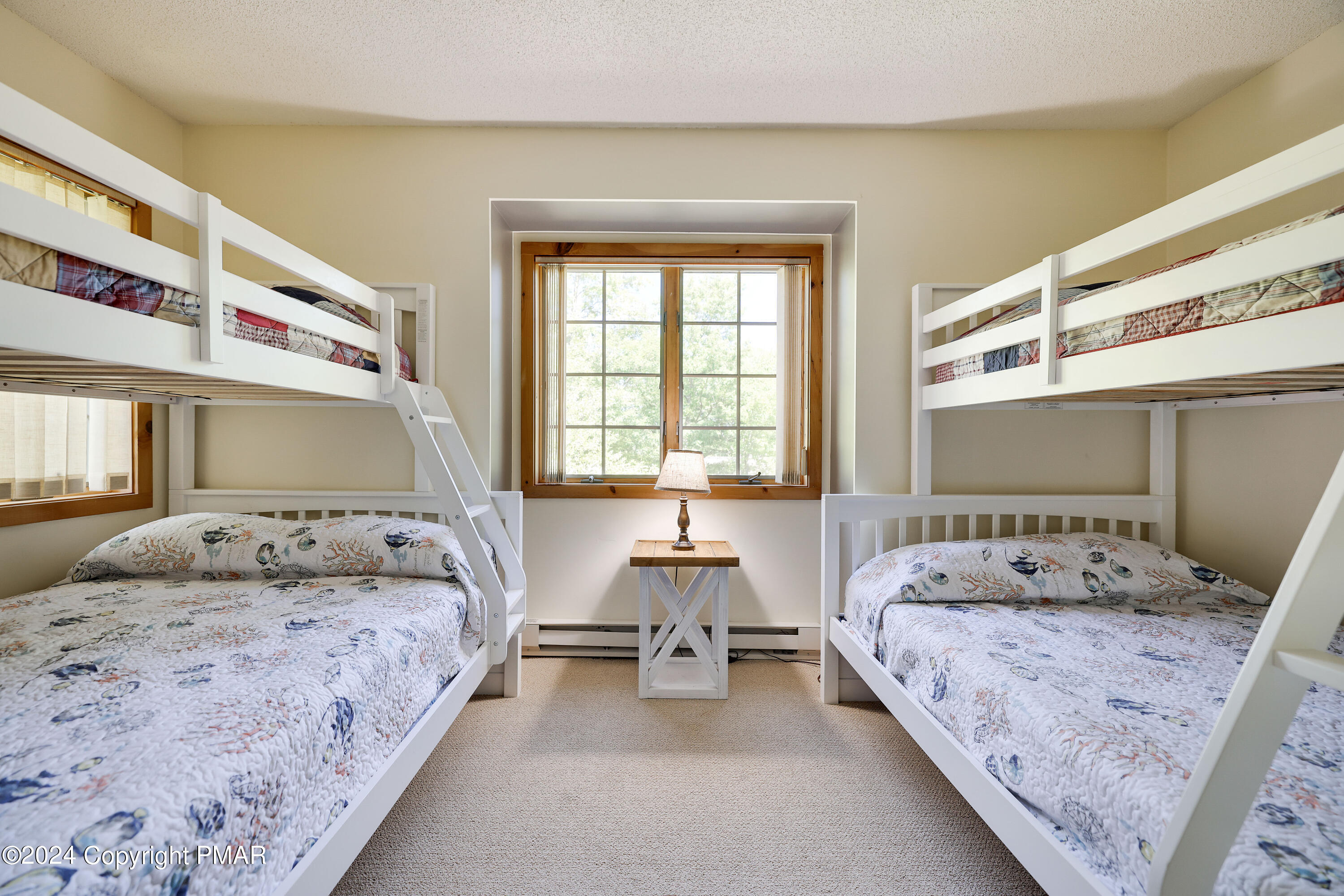 84 Short Hill Rd Lake Lake Harmony, PA 18624 - Photo 37 of 38 a bedroom with a bed and window