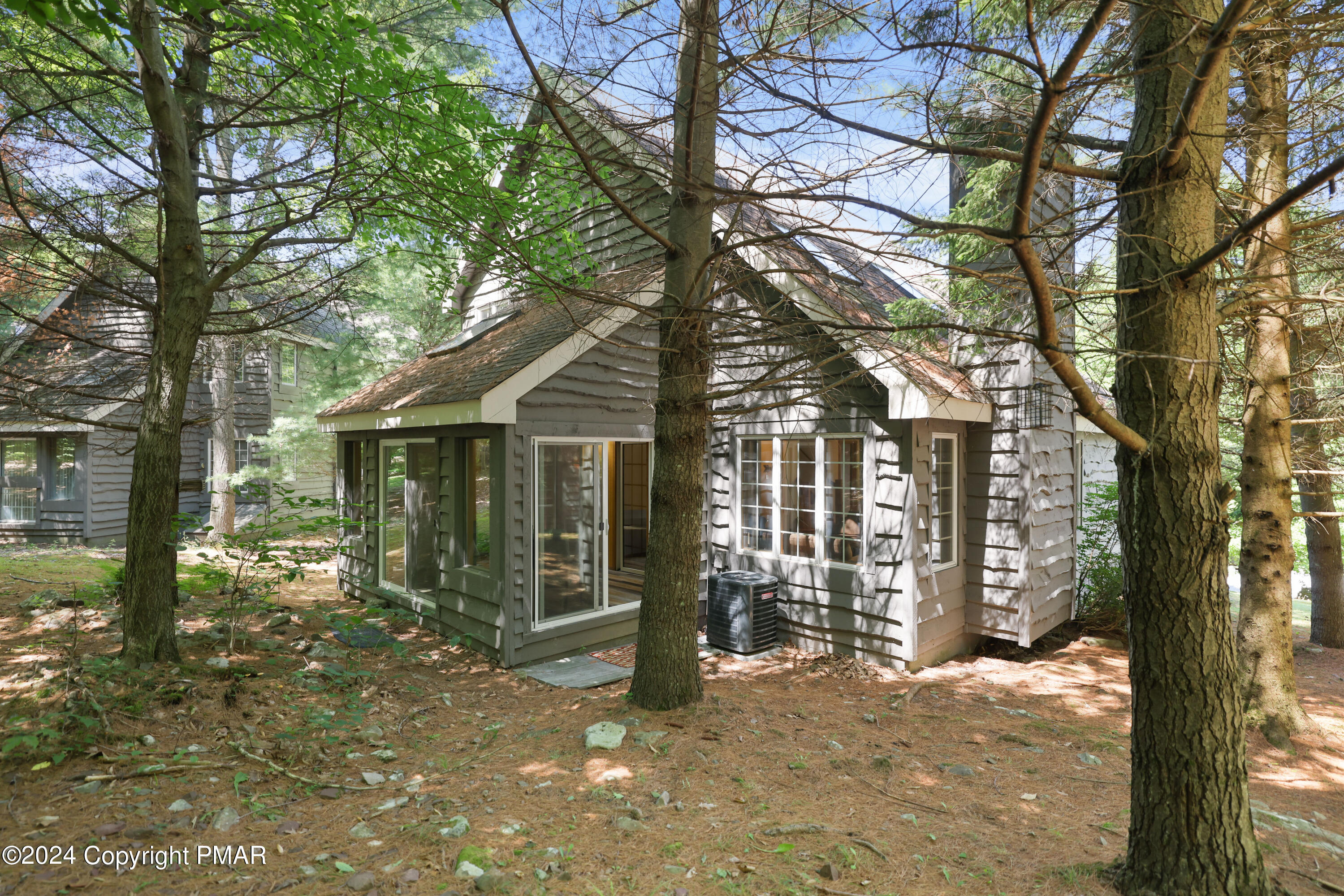 84 Short Hill Rd Lake Lake Harmony, PA 18624 - Photo 38 of 38 a front view of a house with a tree