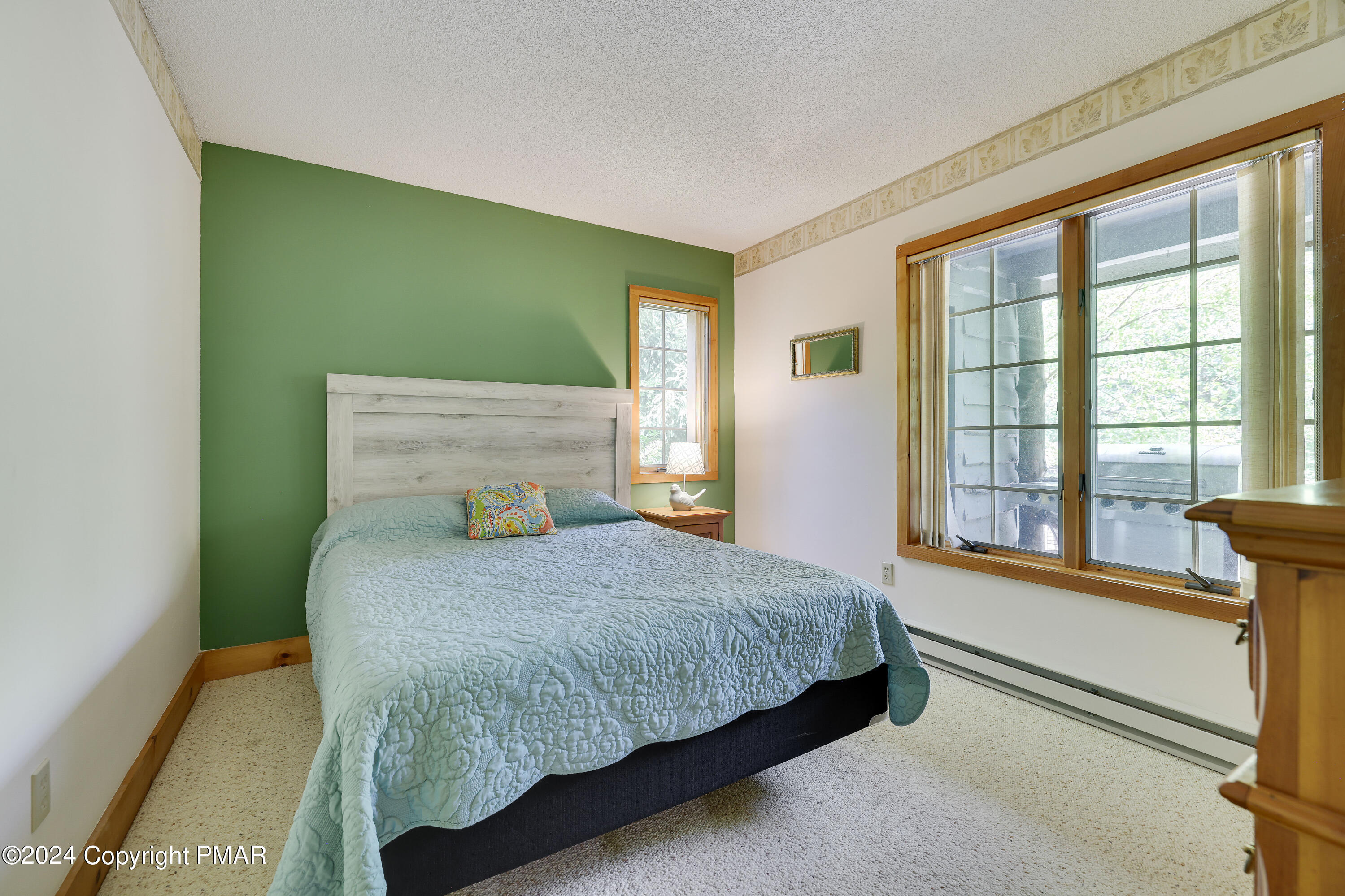 84 Short Hill Rd Lake Lake Harmony, PA 18624 - Photo 7 of 38 a bedroom with a bed and a window