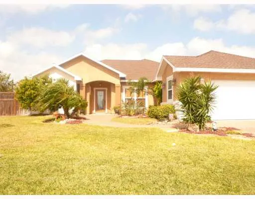 a view of a large pool with an outdoor space