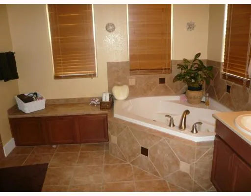 a bathroom with a bathtub and a sink