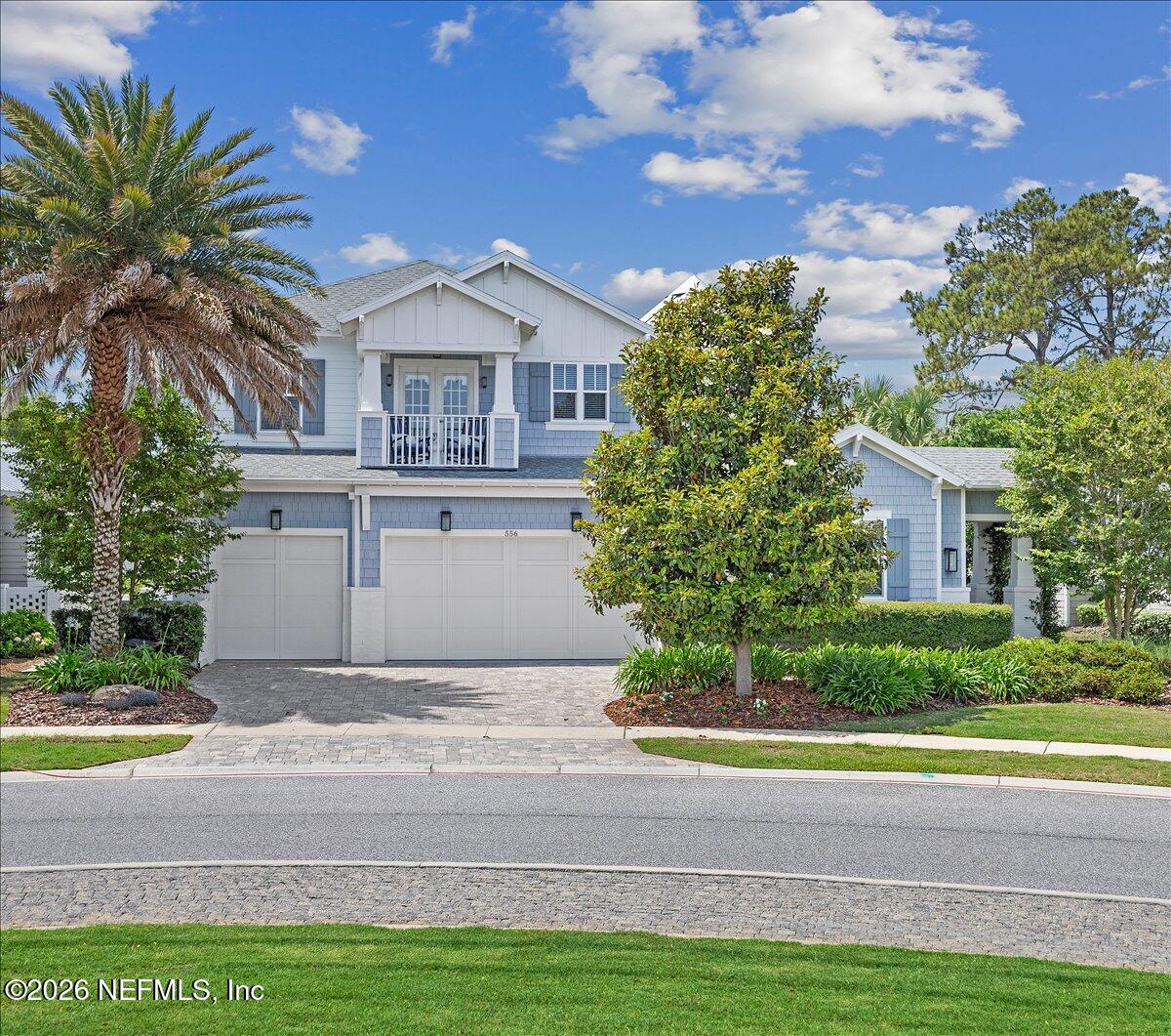 556 Timber Bridge Lane Atlantic Beach, FL 32233 - Photo 1 of 71 a front view of house with yard and green space