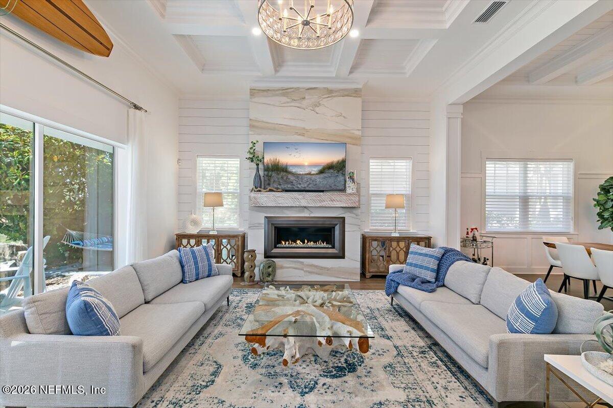 556 Timber Bridge Lane Atlantic Beach, FL 32233 - Photo 14 of 71 a living room with furniture and a fireplace