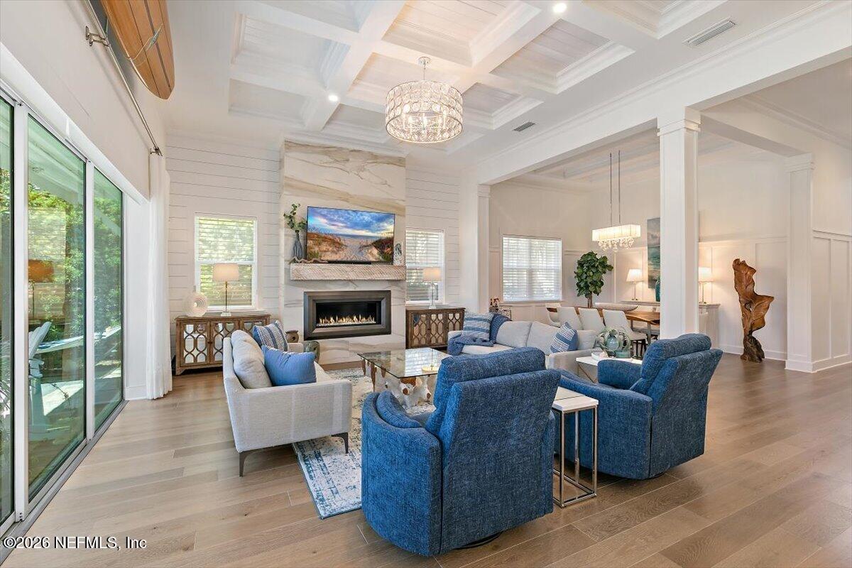 556 Timber Bridge Lane Atlantic Beach, FL 32233 - Photo 15 of 71 a living room with furniture a fireplace and a large window
