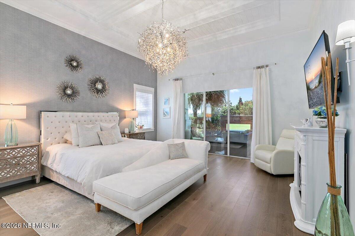 556 Timber Bridge Lane Atlantic Beach, FL 32233 - Photo 25 of 71 a bedroom with a bed couch and a flat tv screen