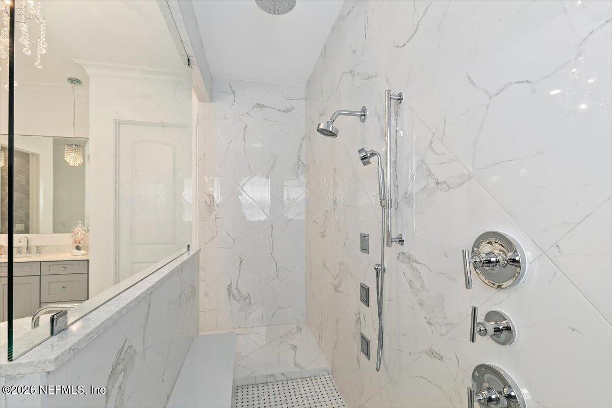 556 Timber Bridge Lane Atlantic Beach, FL 32233 - Photo 33 of 71 a bathroom with a bathtub and shower