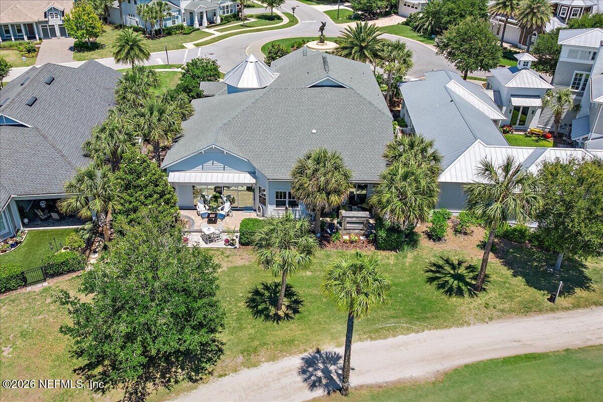 556 Timber Bridge Lane Atlantic Beach, FL 32233 - Photo 52 of 71 an aerial view of a house with a yard and lake view