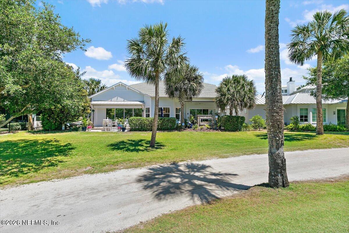 556 Timber Bridge Lane Atlantic Beach, FL 32233 - Photo 56 of 71 a front view of house with yard and green space