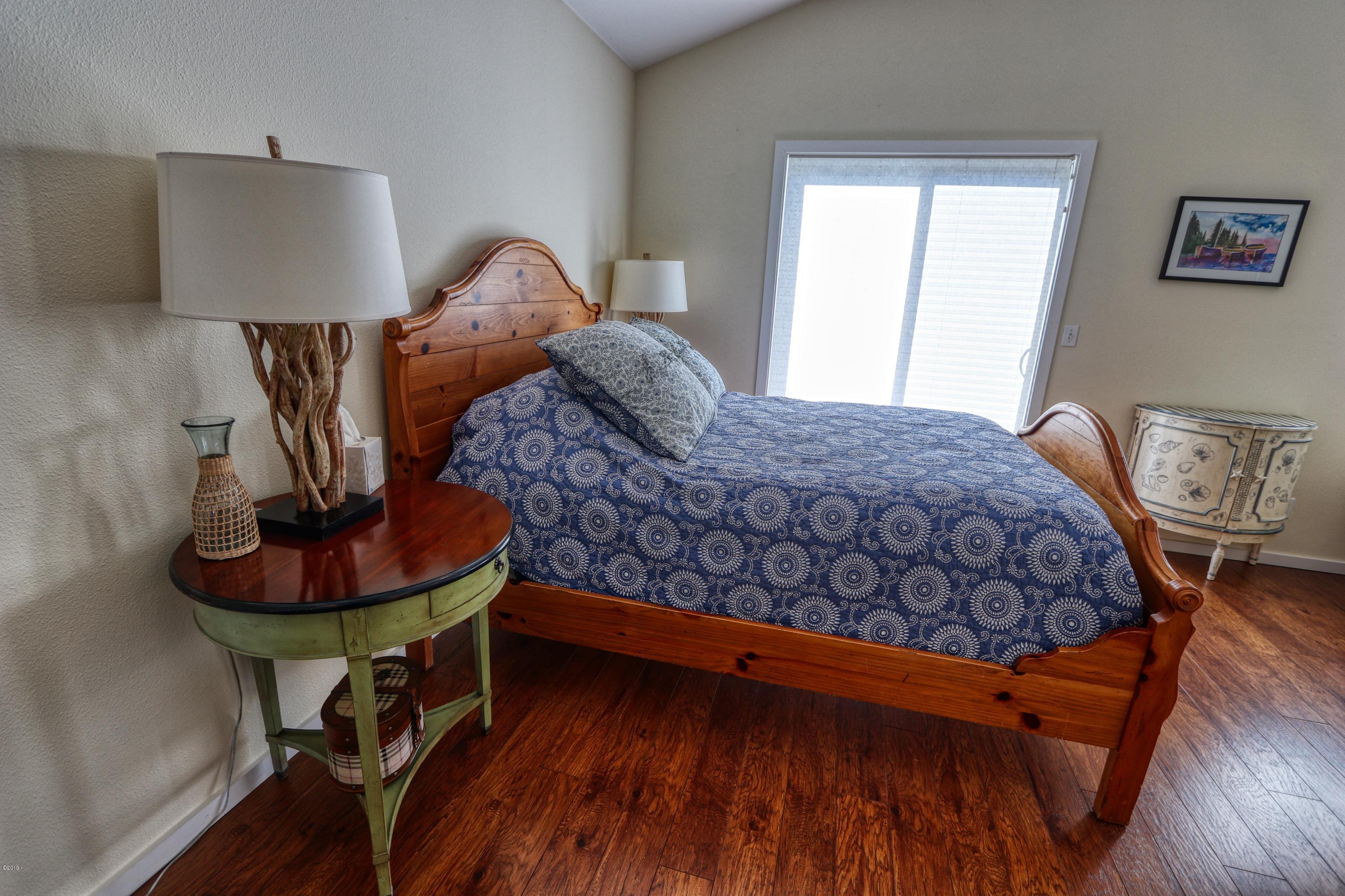 236 Southwest 27th Street South Beach, OR 97366 - Photo 15 of 25 Master Bedroom