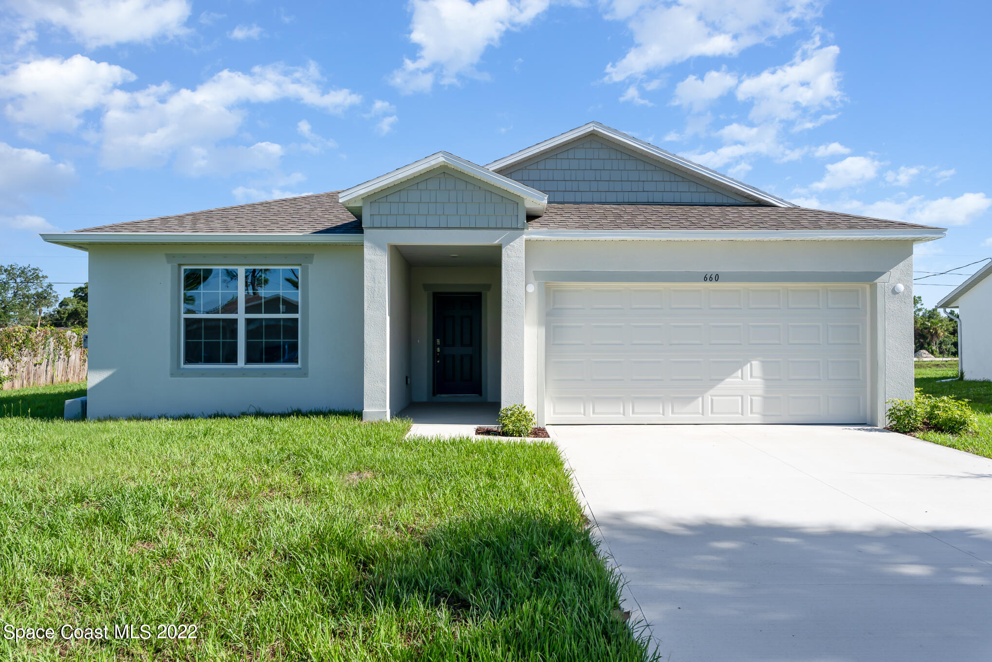 660 Sauders Road Southeast Palm Bay, FL 32909 - Photo 1 of 23 Front of house